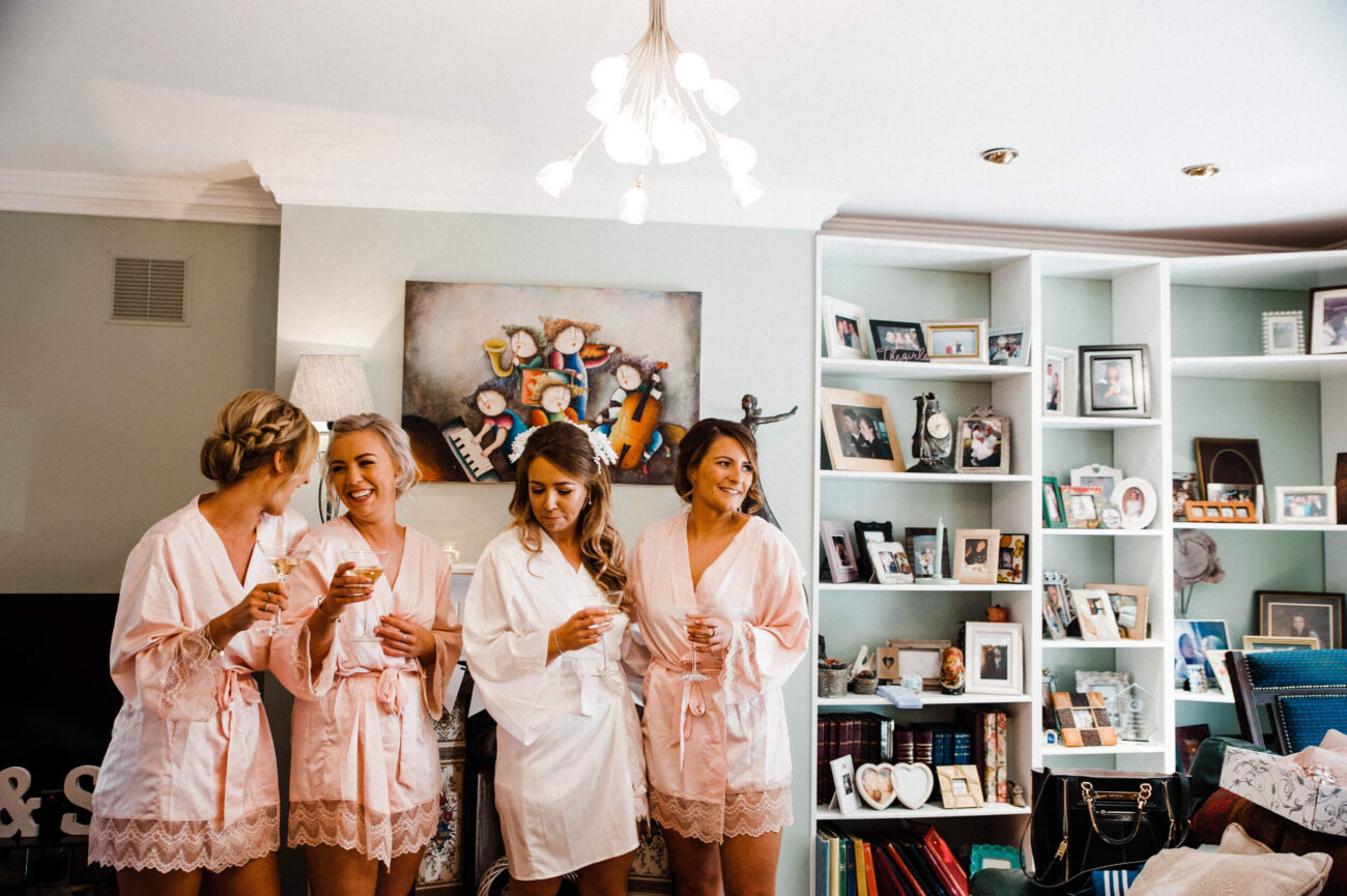 Bridesmaids laughing together