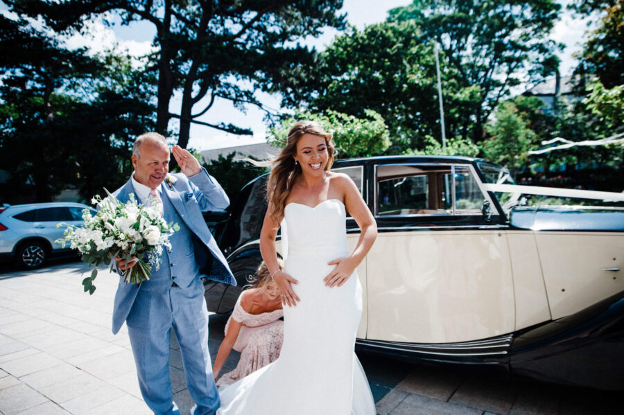 Bride coming out of the car at St Sylvester's Church, Malahide