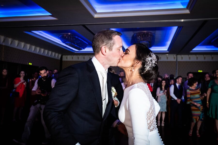 Bride and groom kissing at first dance at Kilronan Castle wedding