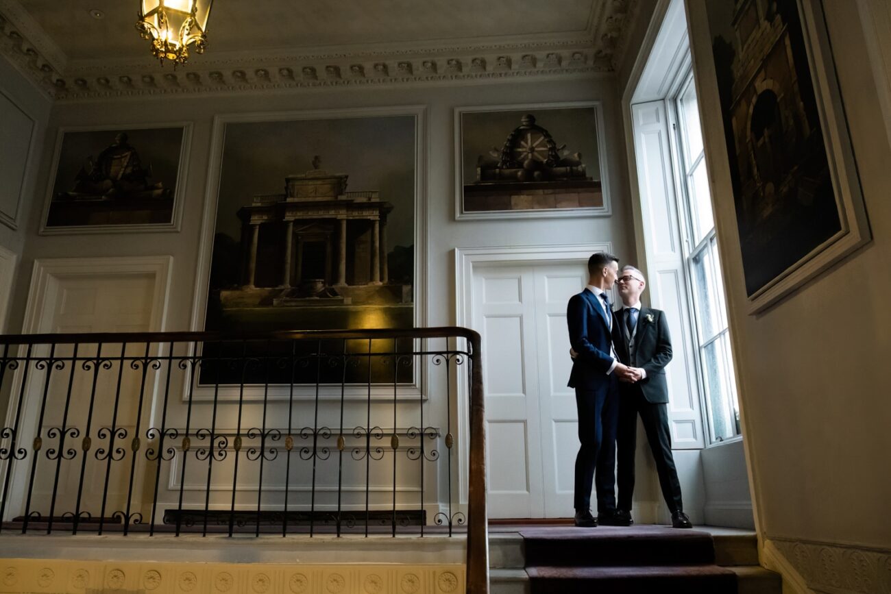 wedding portraits at window at The Merrion Hotel