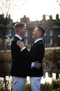 couple embracing in the sunlight at the canal in dublin 2