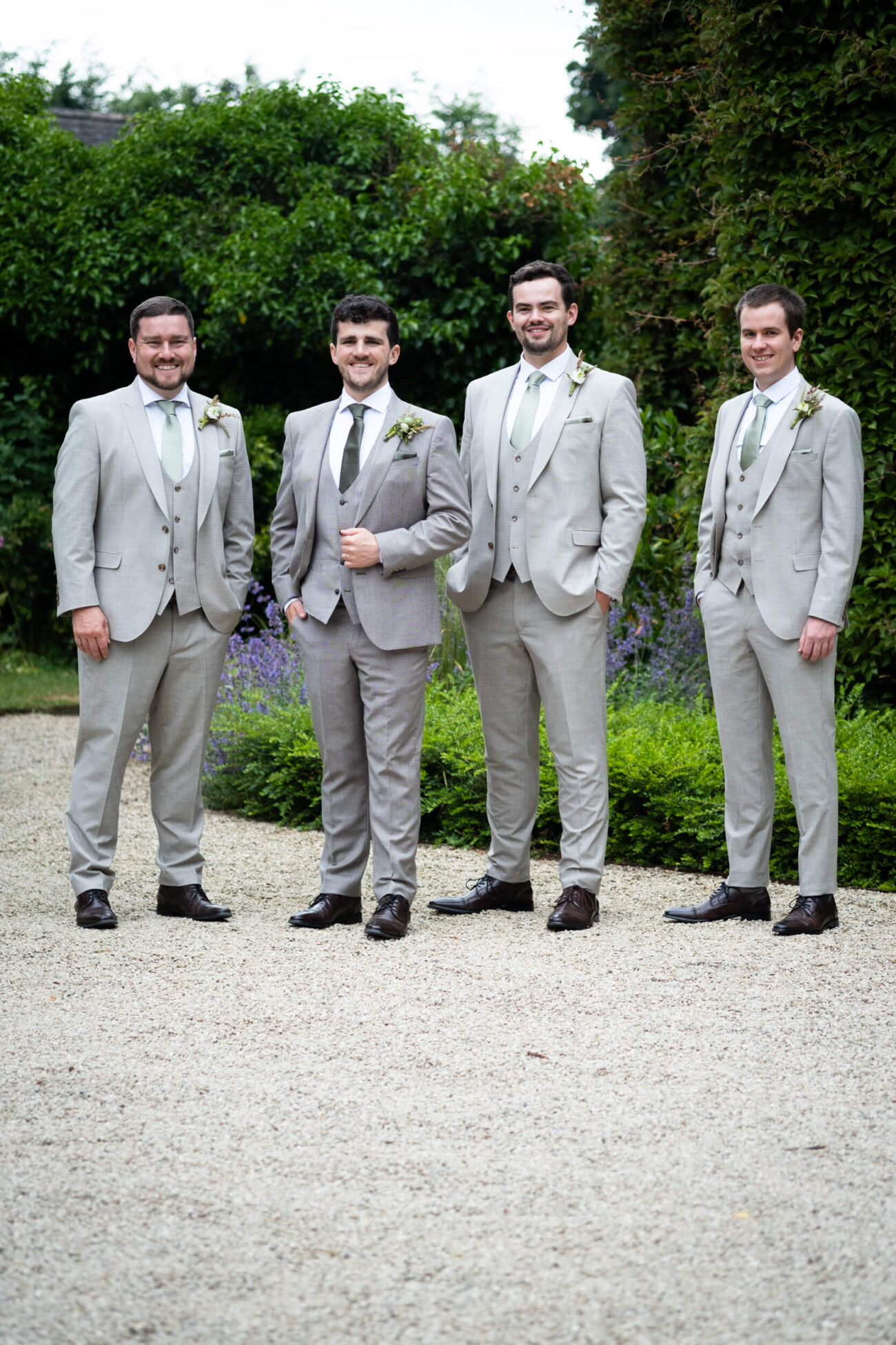 Groomsmen posing at the front of the house in Ballintubbert Gardens and House