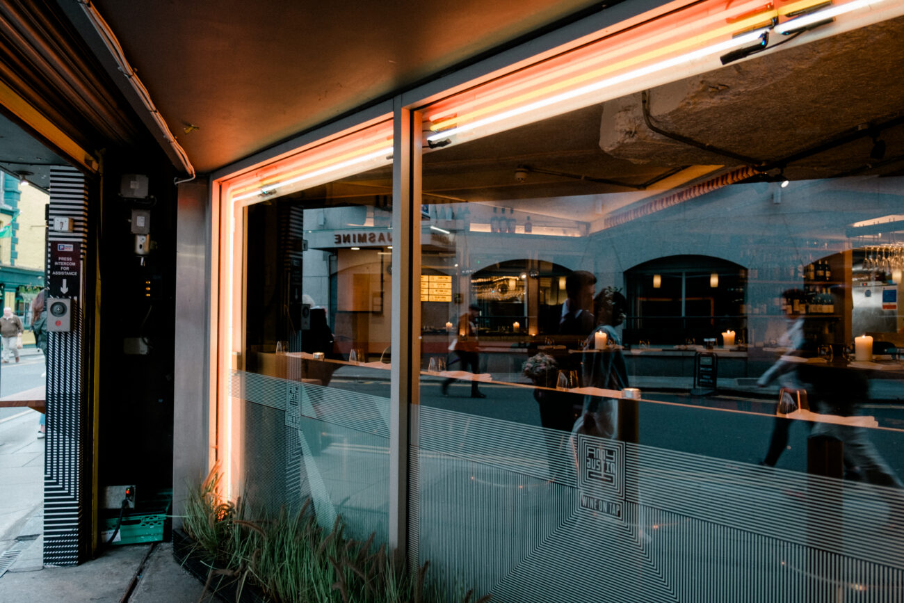 reflection of couple standing at the front of Amy Austin restaurant, Dublin City Wedding, elopement in Dublin