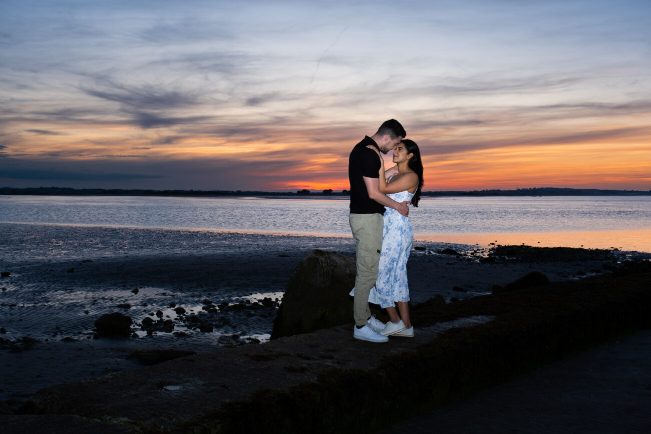 sunset photo of couple on Burrow Beach