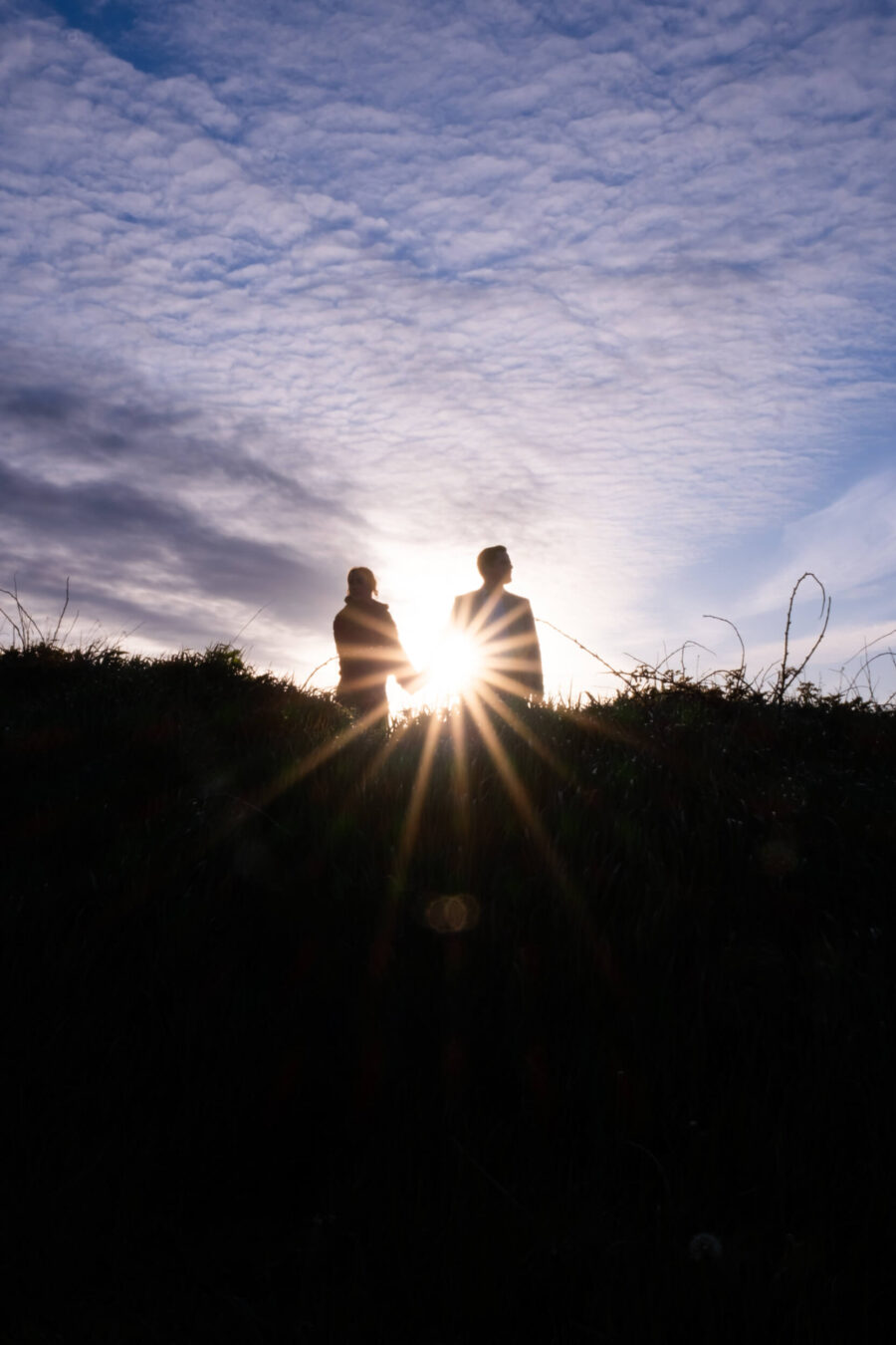 Couple getting engaged at Howth Head in Dublin by secret proposal