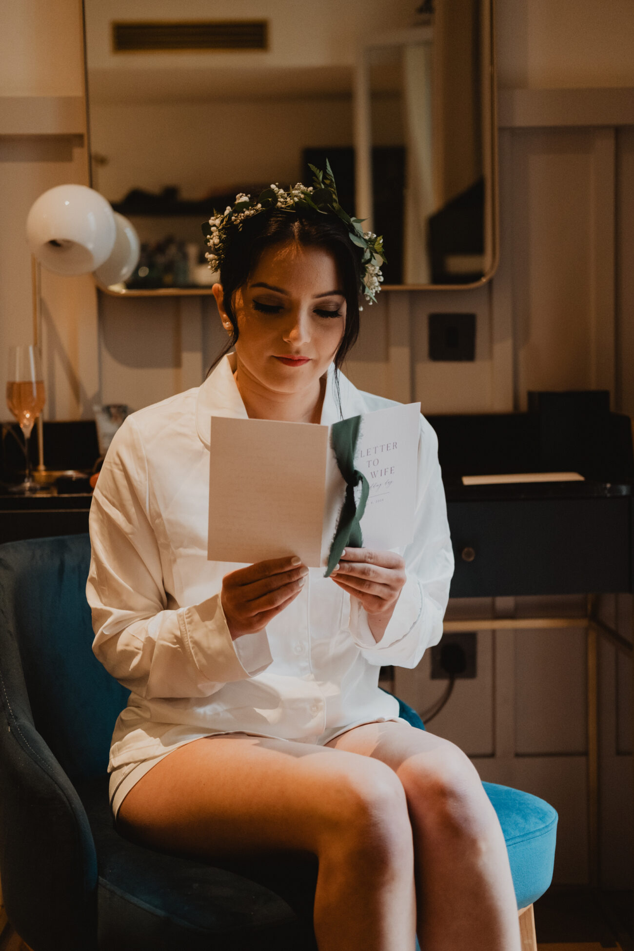 Bride reading her letter from the groom at The Clarence Hotel