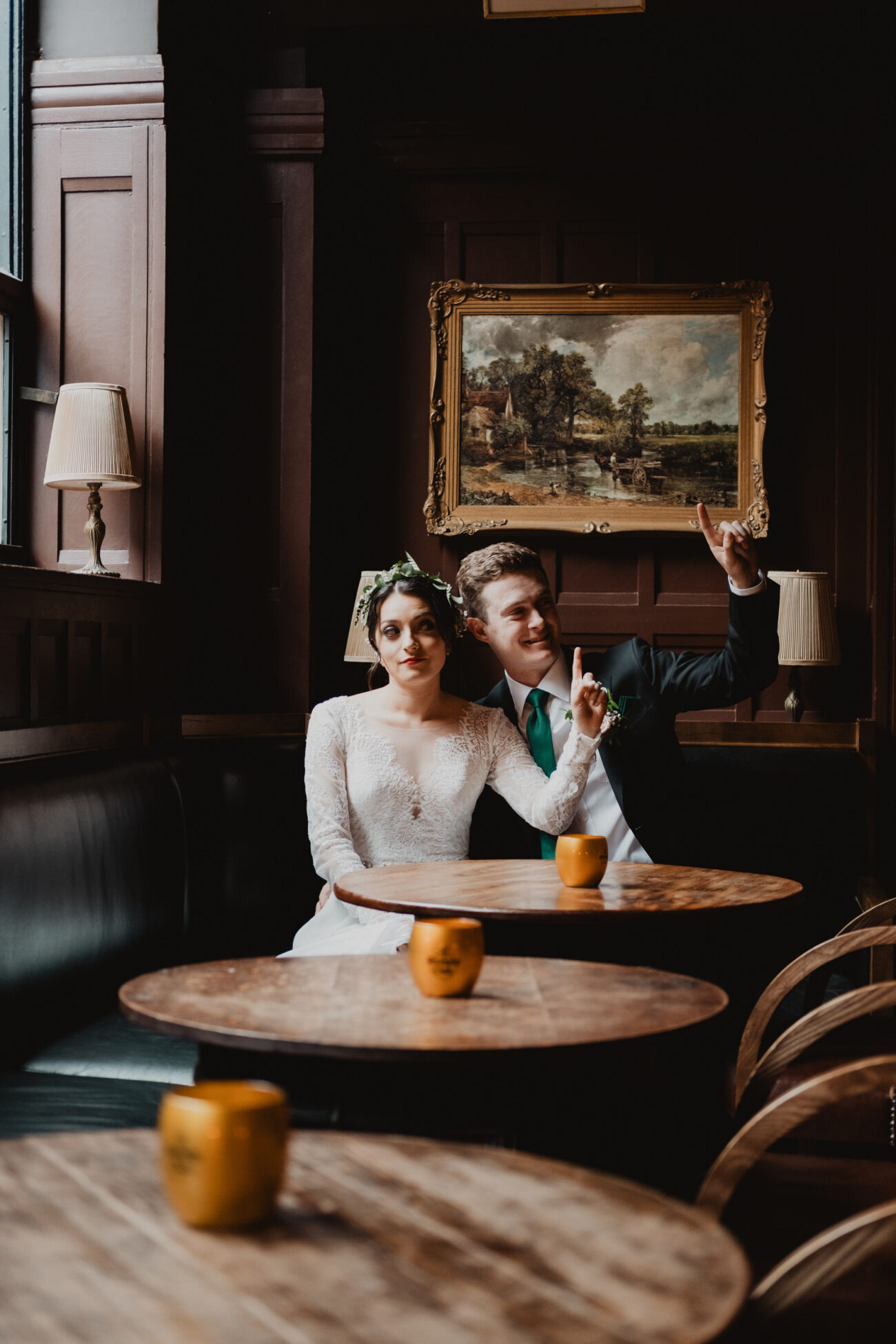 Bride and groom calling for a drink at The Oak Bar in The Clarence Hotel, wedding at The Clarence Hotel