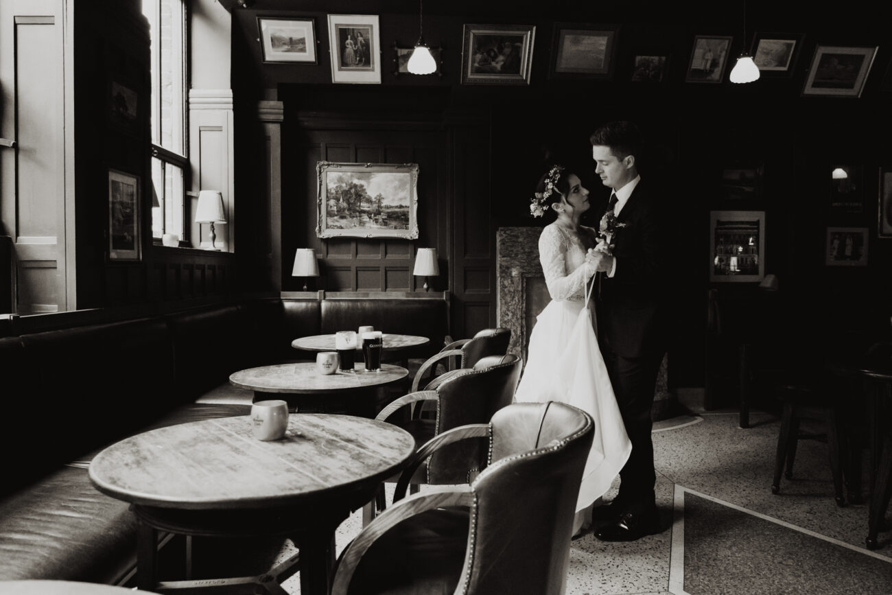 Bride and groom dancing in The Oak Bar at The Clarence Hotel, wedding at The Clarence Hotel