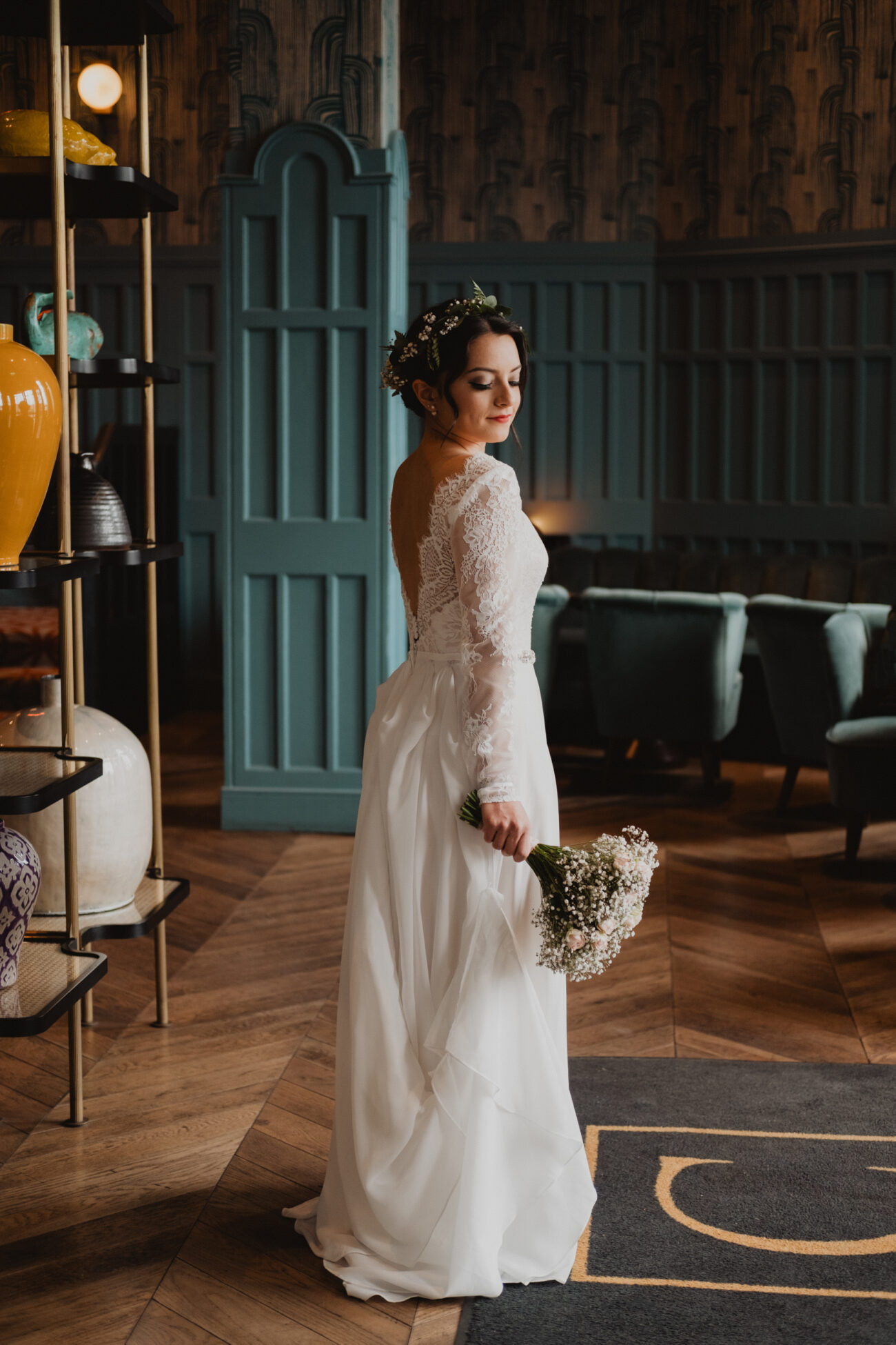 Bride standing at The front door of The Clarence Hotel, wedding at The Clarence Hotel