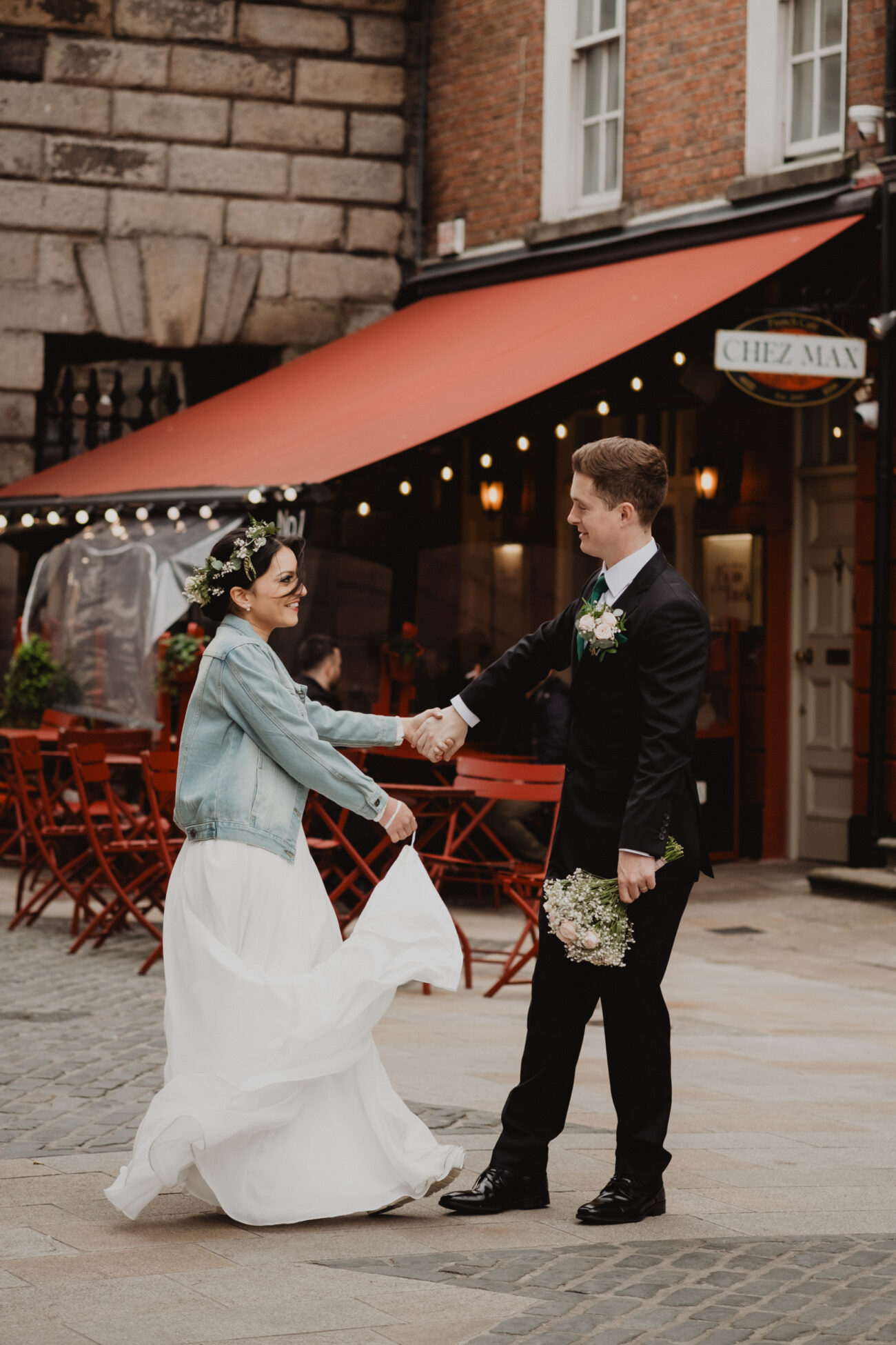 Bride and groom dancing near Dublin castle, wedding at The Clarence Hotel, Dublin City wedding, Elopement in Dublin city