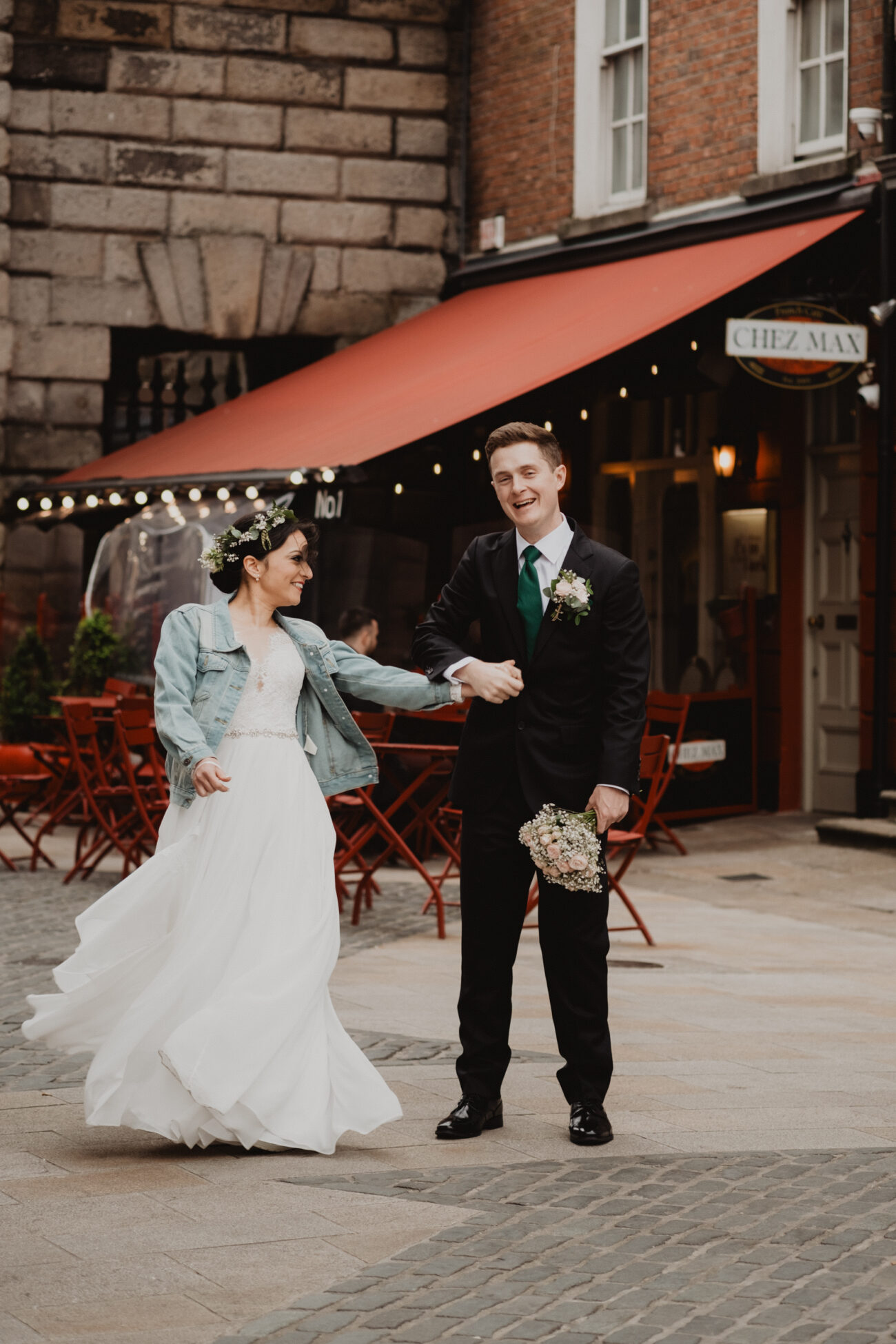 Bride and groom dancing near Dublin castle, wedding at The Clarence Hotel, Dublin City wedding, Elopement in Dublin city