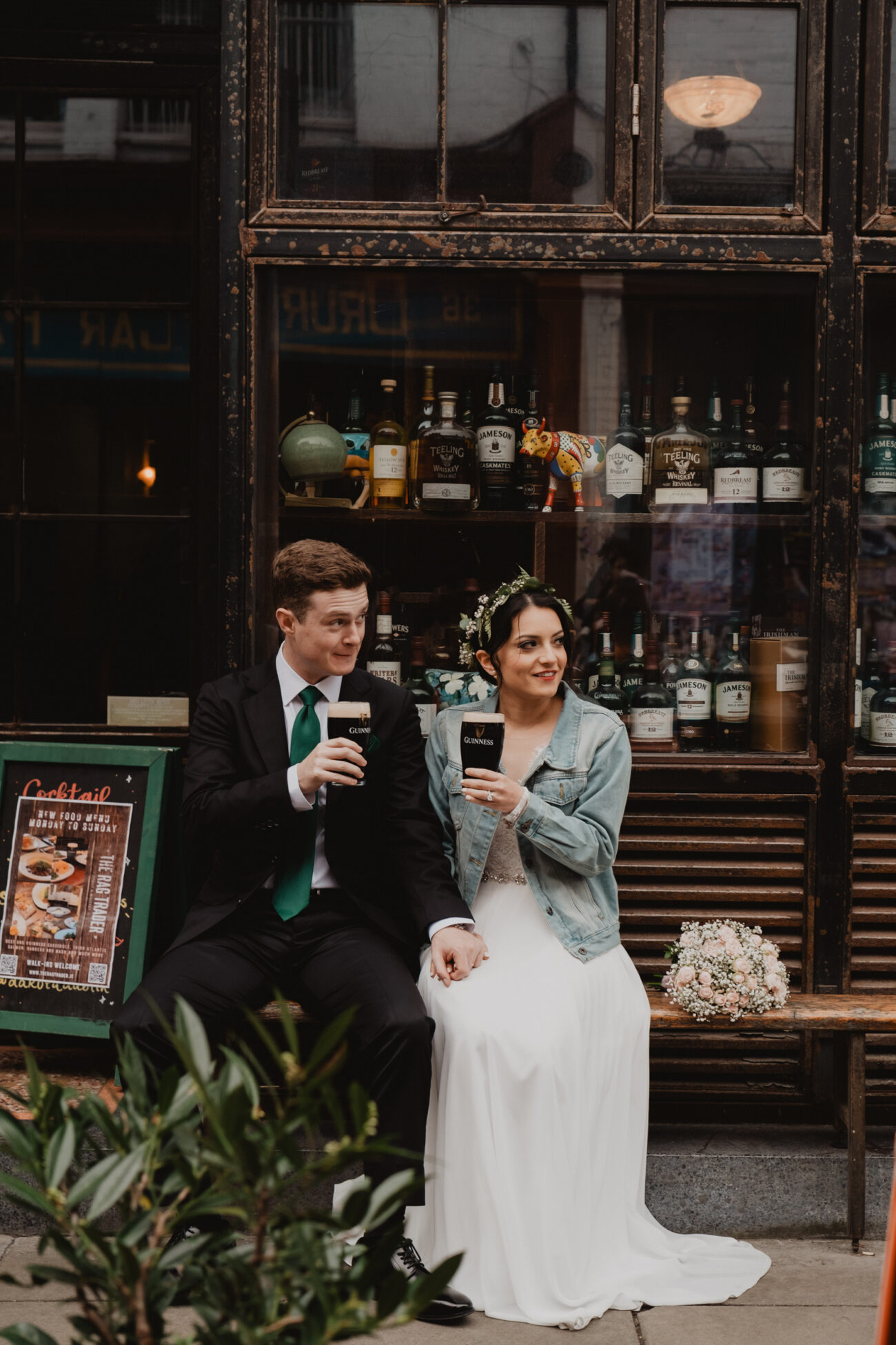 Couple sitting outisde The Rag Trader Pub, Dublin City Wedding, elopement in Dublin