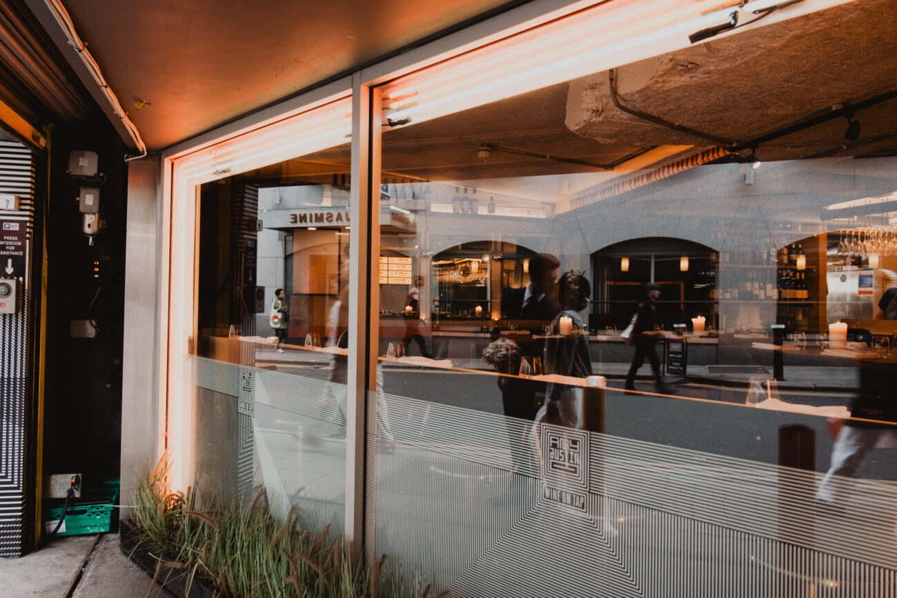 reflection of couple standing at the front of Amy Austin restaurant, Dublin City Wedding, elopement in Dublin