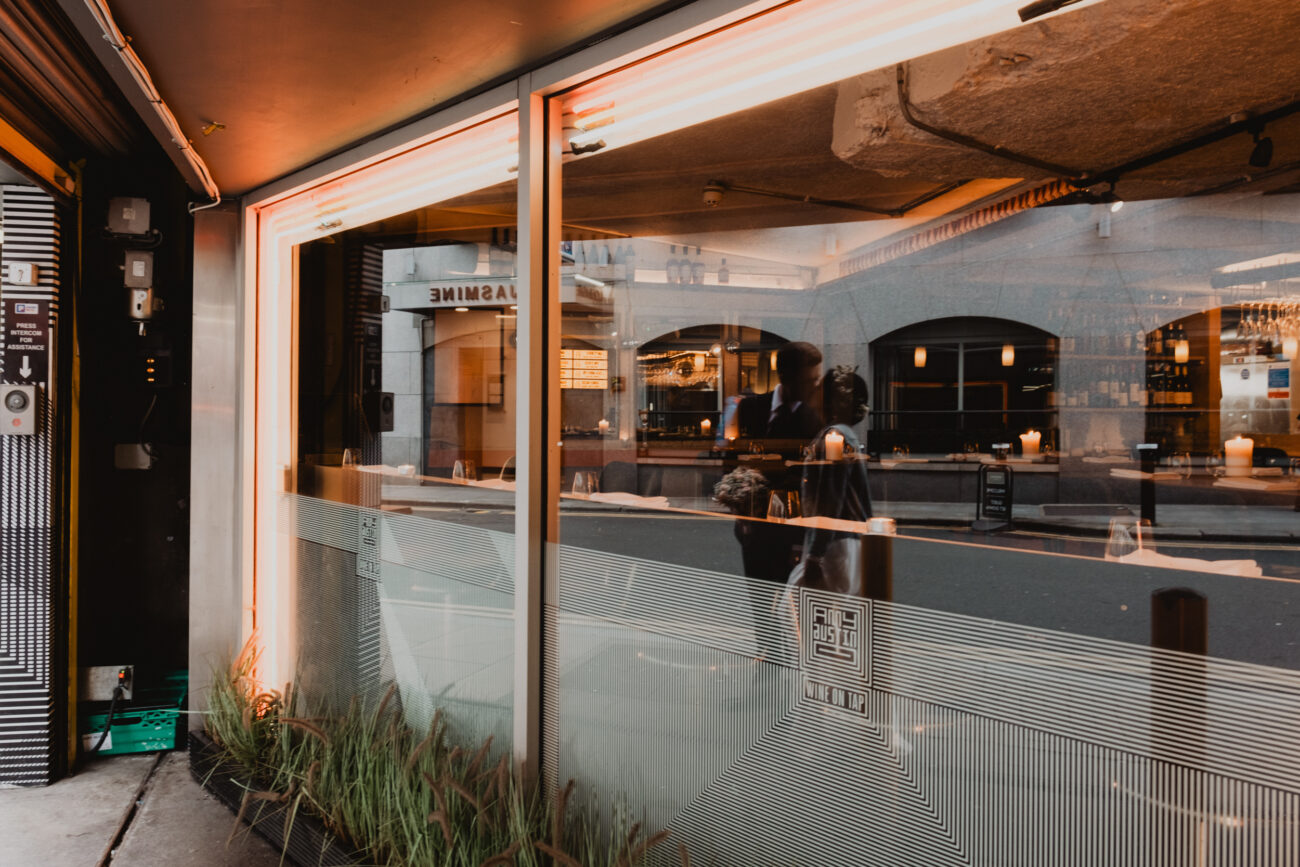 Reflection of couple standing outside Amy Austin restaurant, Dublin City Wedding, elopement in Dublin