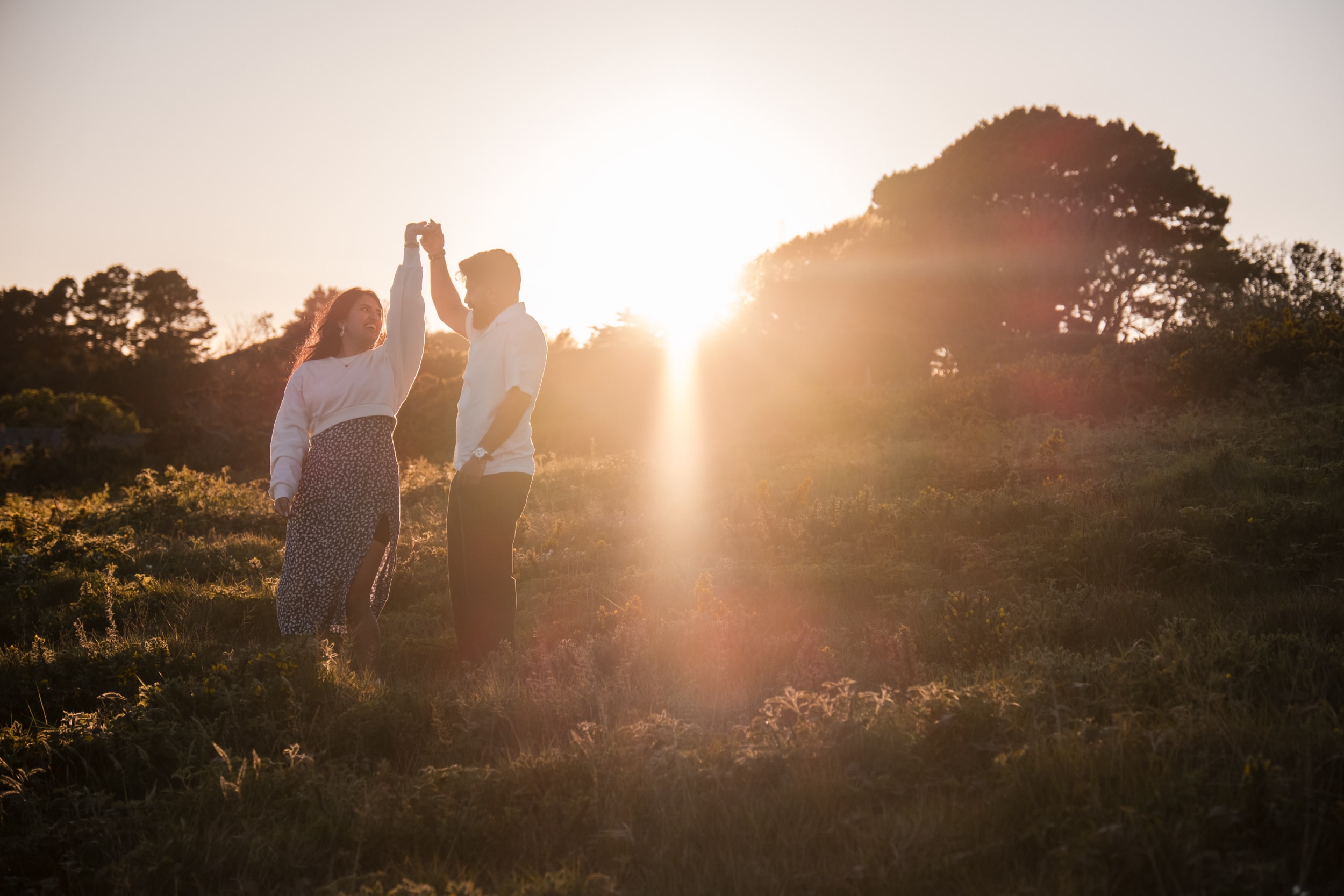 couple dancing in the sunset light at Howth Summit