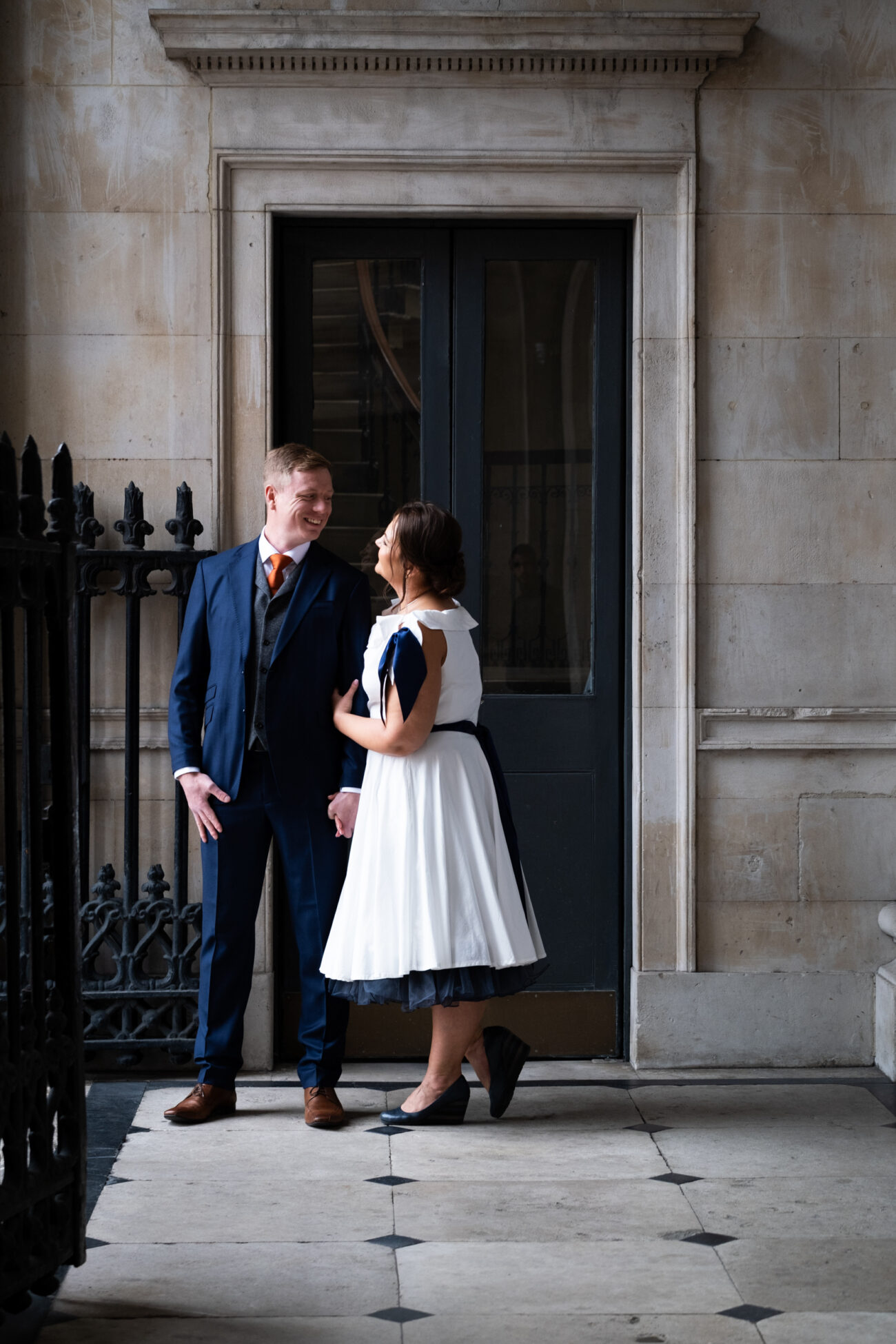 Couple looking at each other on the balcony of Dublin City Hall, Dublin City Hall wedding