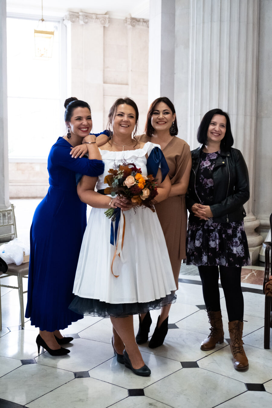 guests posing with the bride at Dublin City Hall