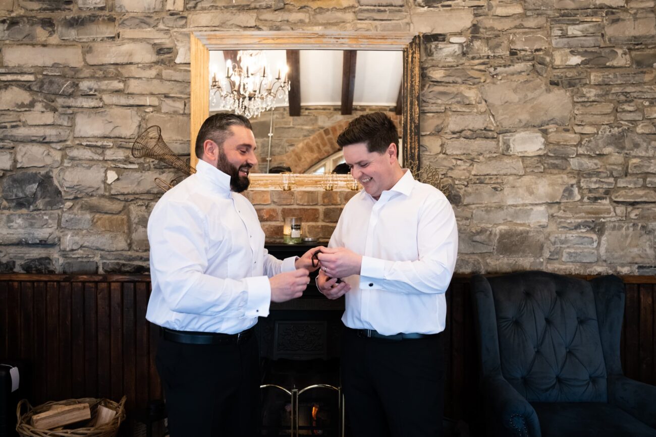 groomsmen getting ready in the coach house at Ballymagarvey Village