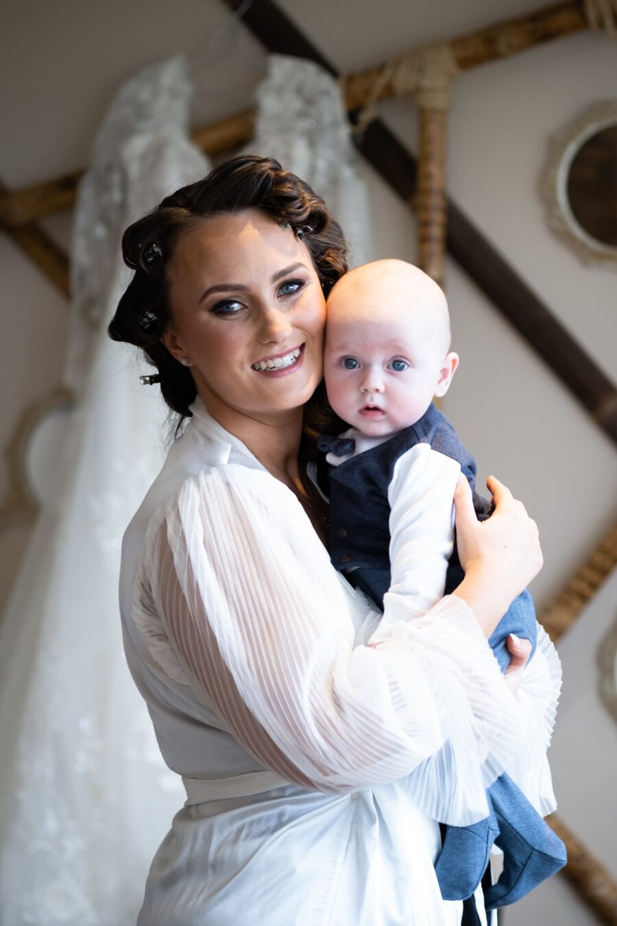 bride and baby boy during bridal prep at Ballymagarvey Village