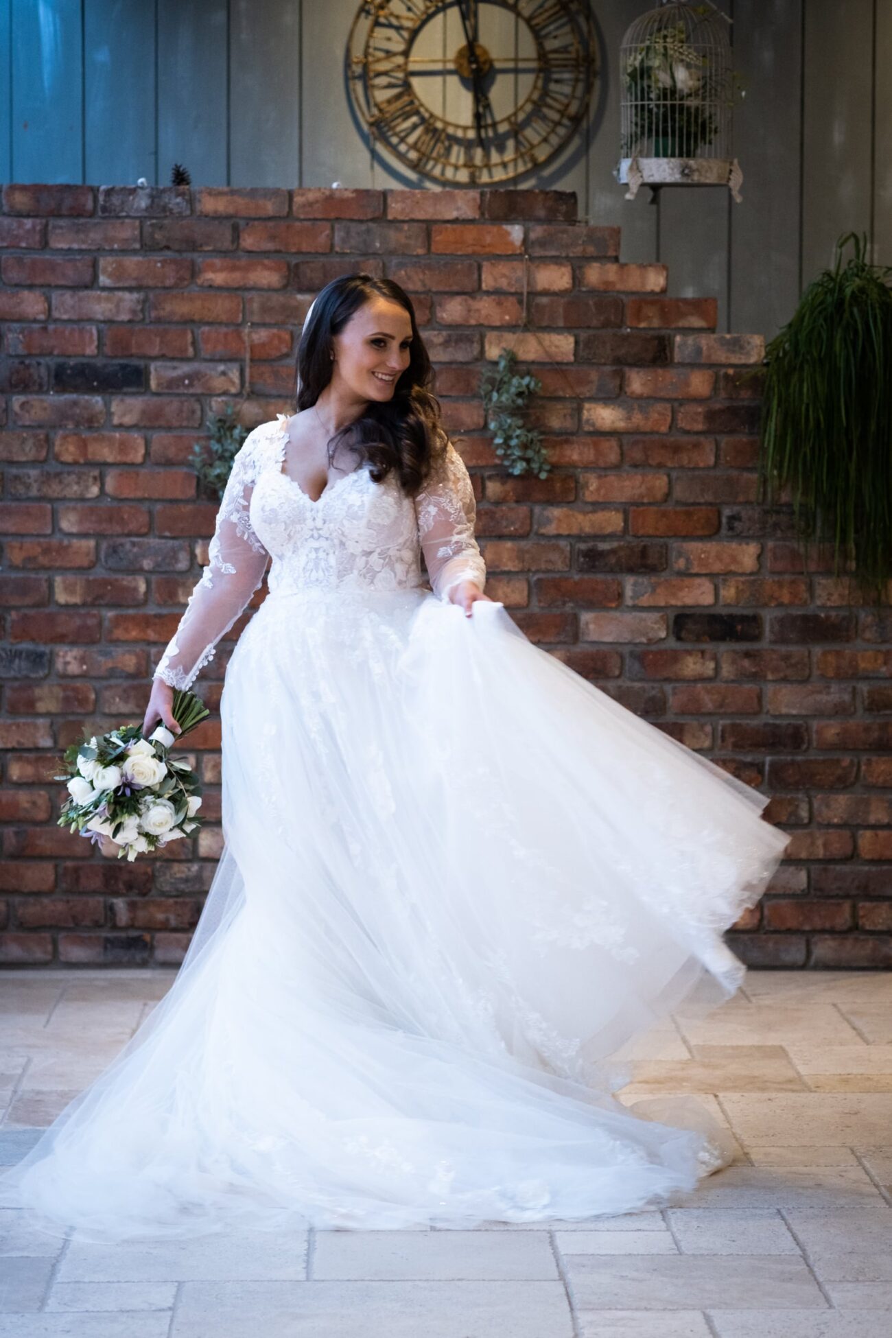 Bride spinning her dress inside the manor house of Ballymagarvey Village