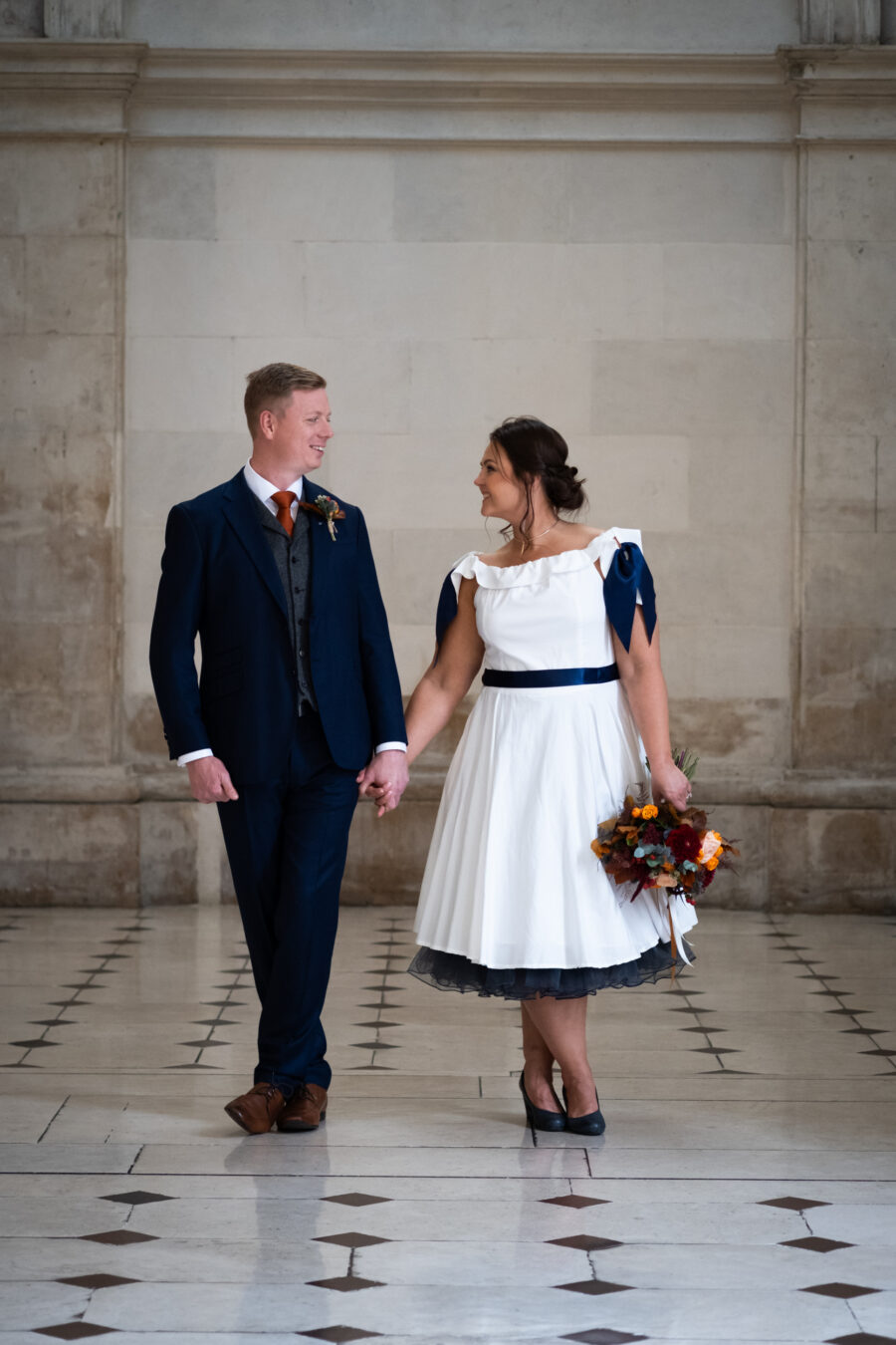 Bride and groom facing each other at Dublin City Hall