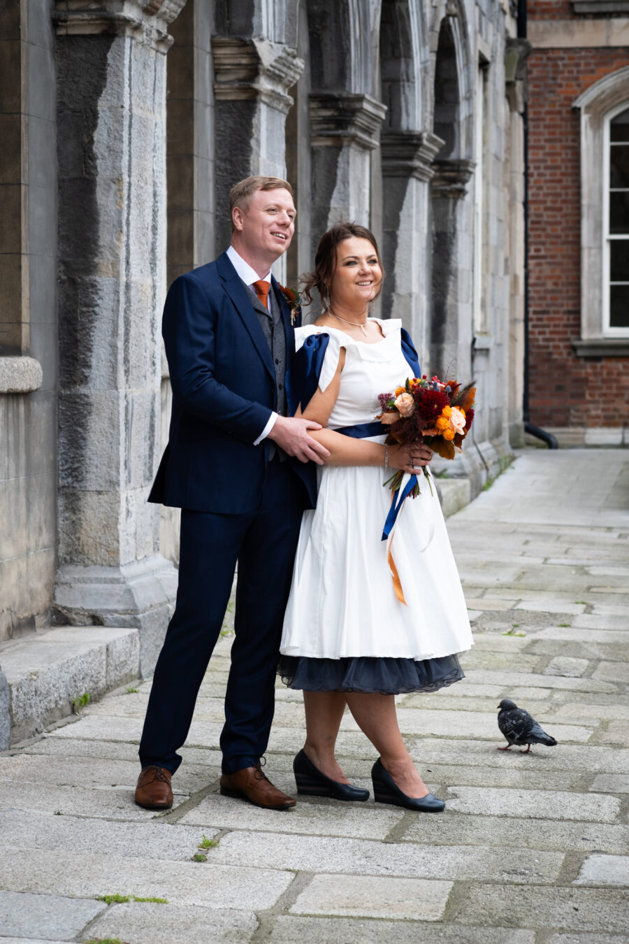 couple looking into the distance at Dublin Castle