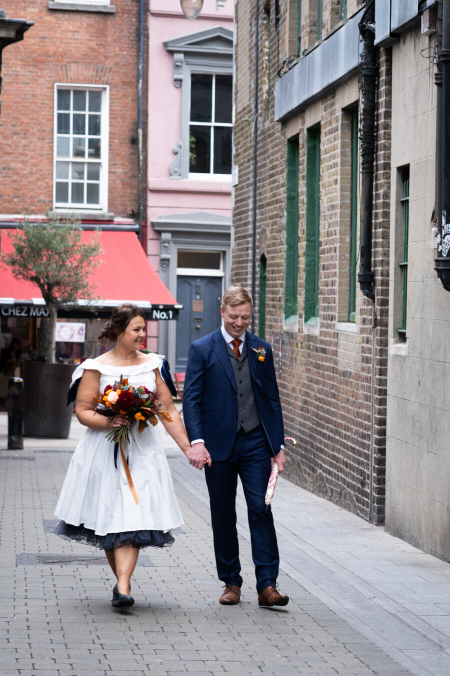 couple walking through streets of Dublin