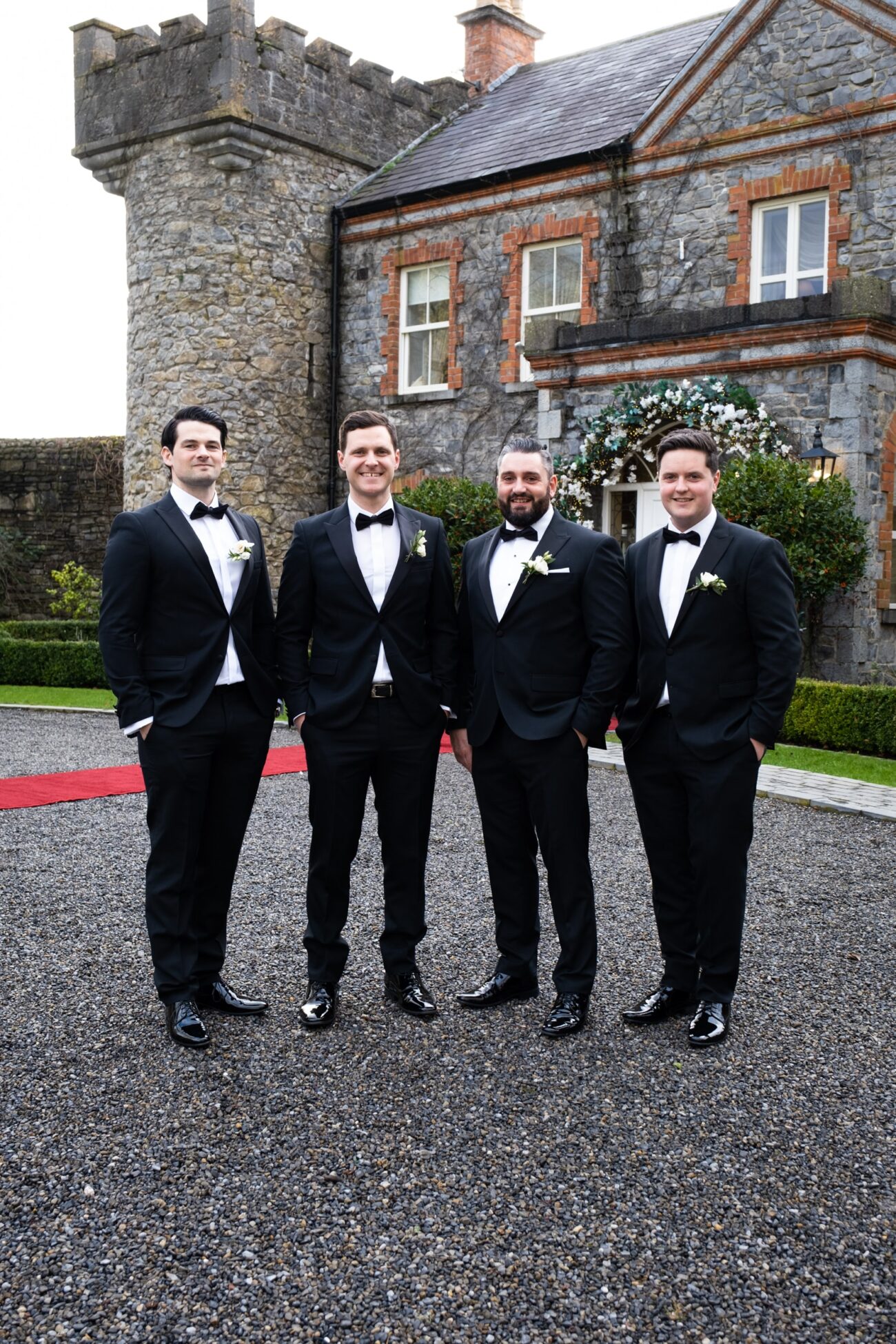 groomsmen shot outside the front of Ballymagarvey Village Manor house