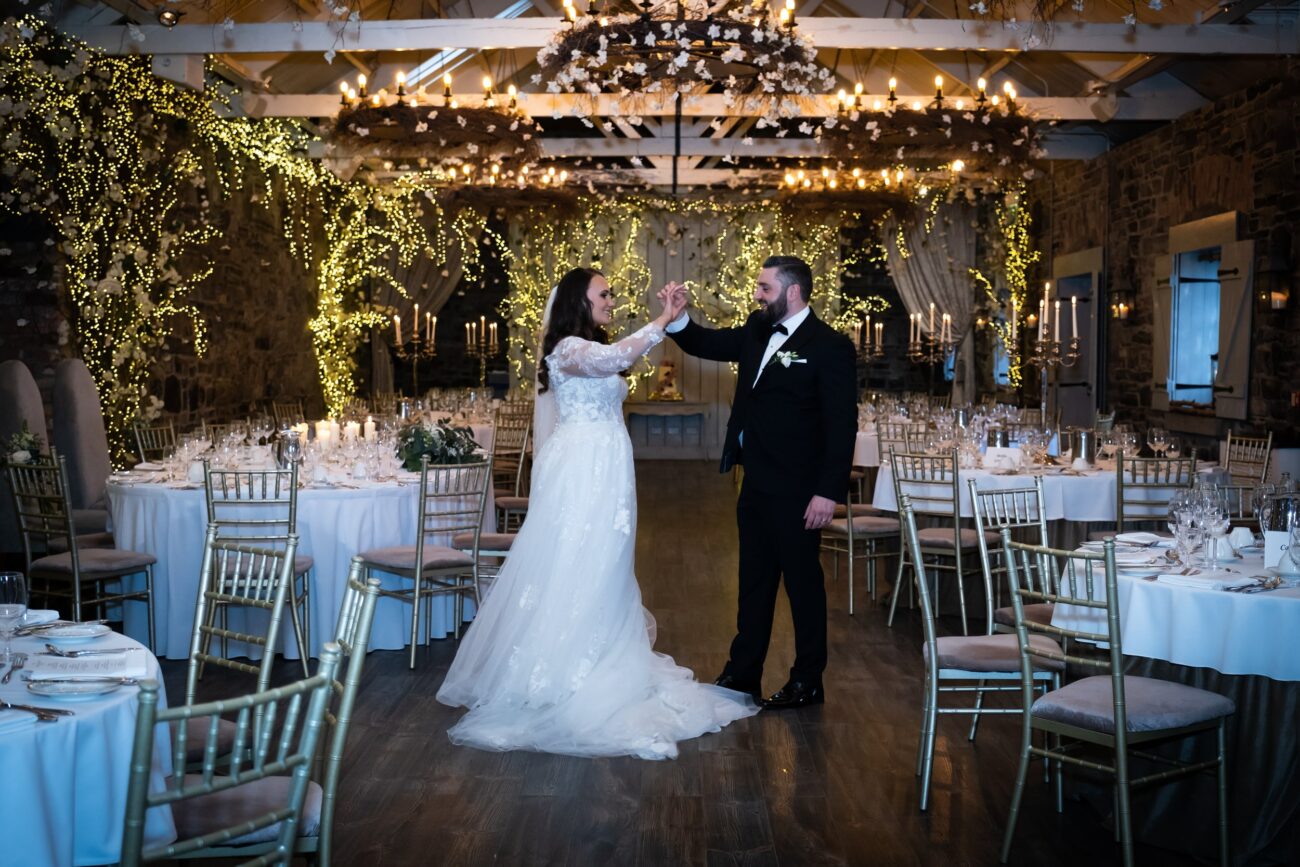 Bride and groom dancing in the banqueting hall at Ballymagarvey Village