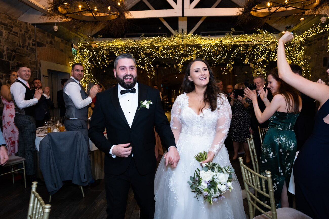 bride and groom at the grand entrance at Ballymagarvey Village