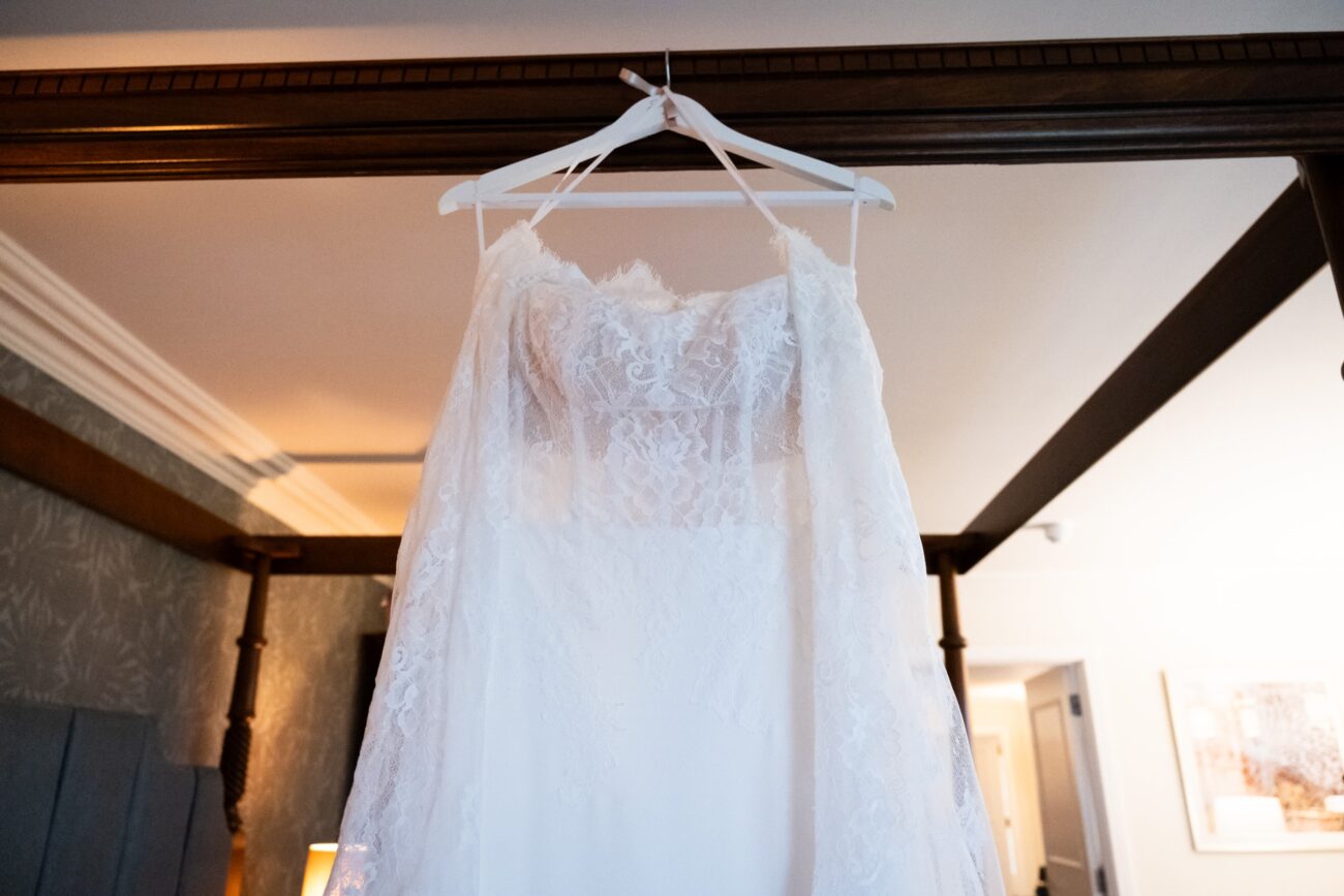 wedding dress handing up on four poster bed at a wedding at Killashee Hotel