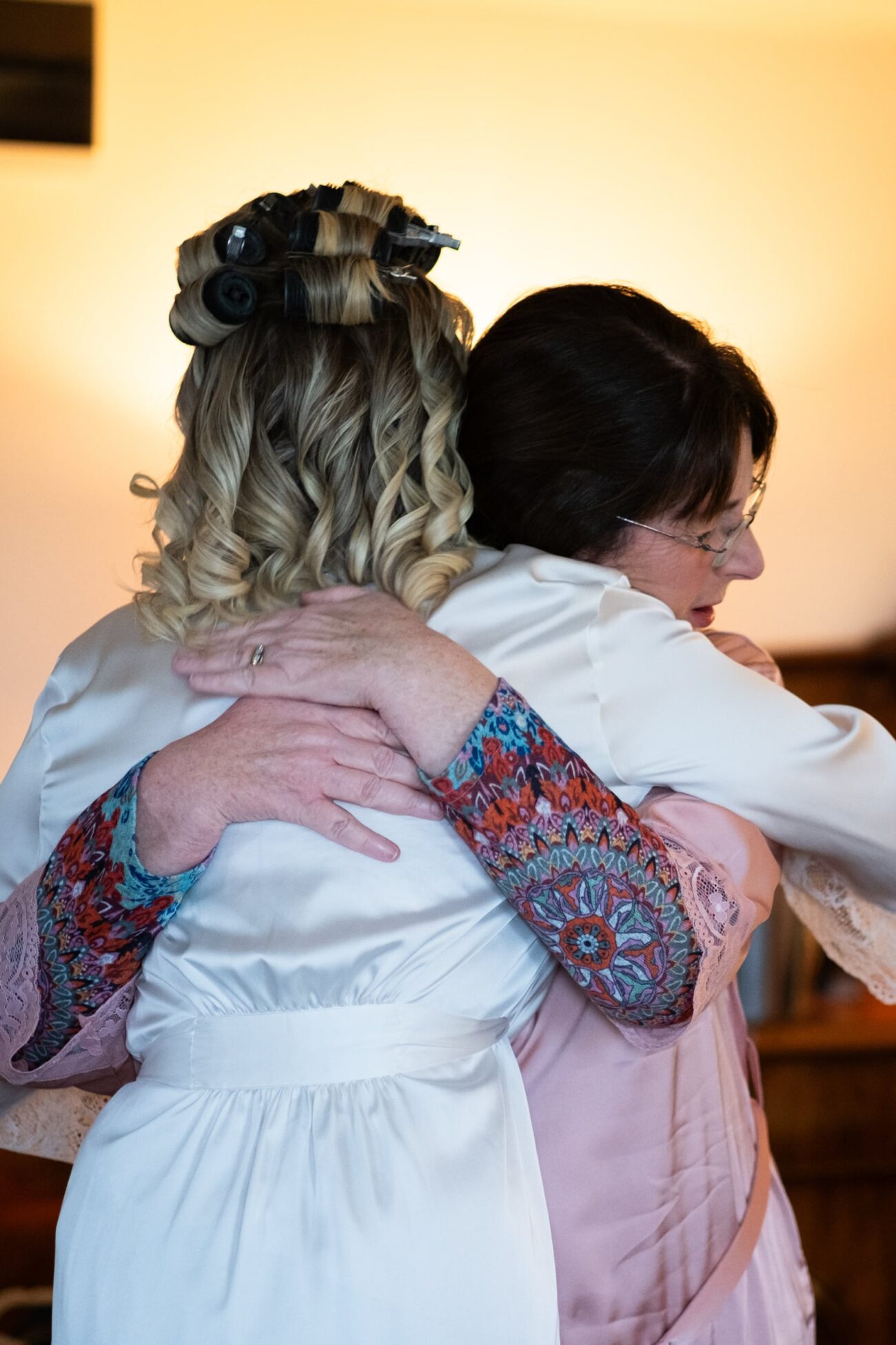 Bride hugging her mum during bridal preparaion at a wedding at Killashee Hotel