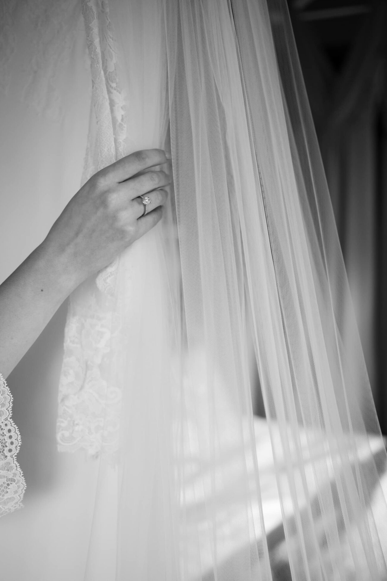 Close up of hands holding the dress at Killashee Hotel