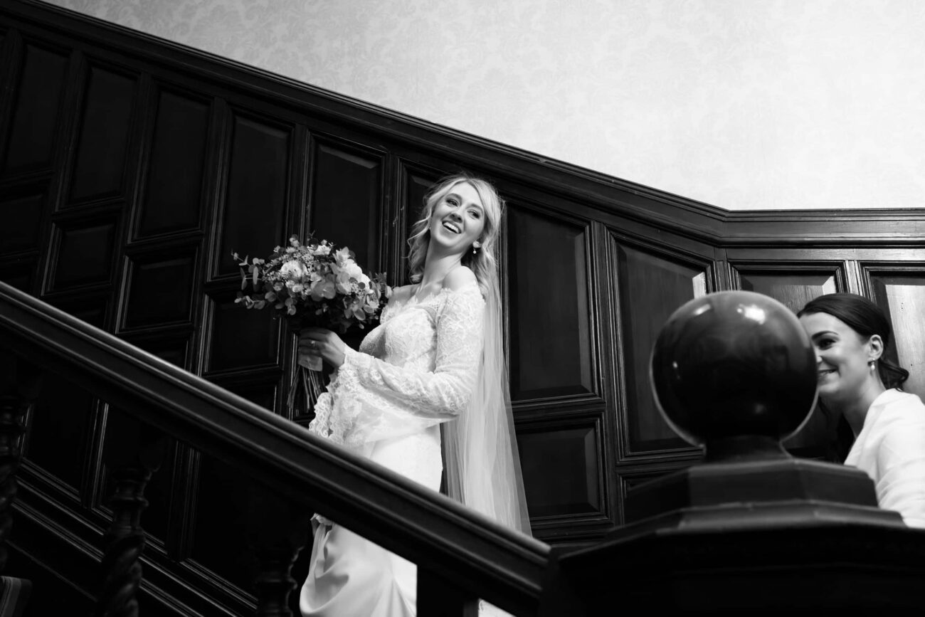 Bride walking up the stairs in the old house at Killashee Hotel