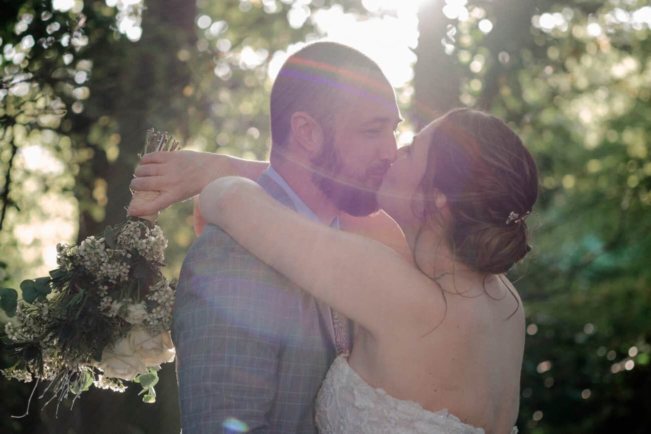 Couple kissing in the forrest in Howth Castle