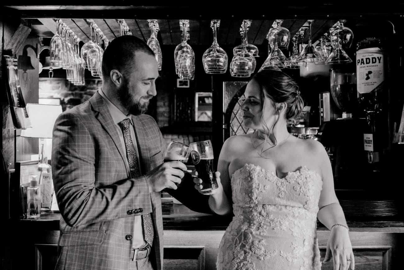 Couple drinking a pint in the Abbey Tavern