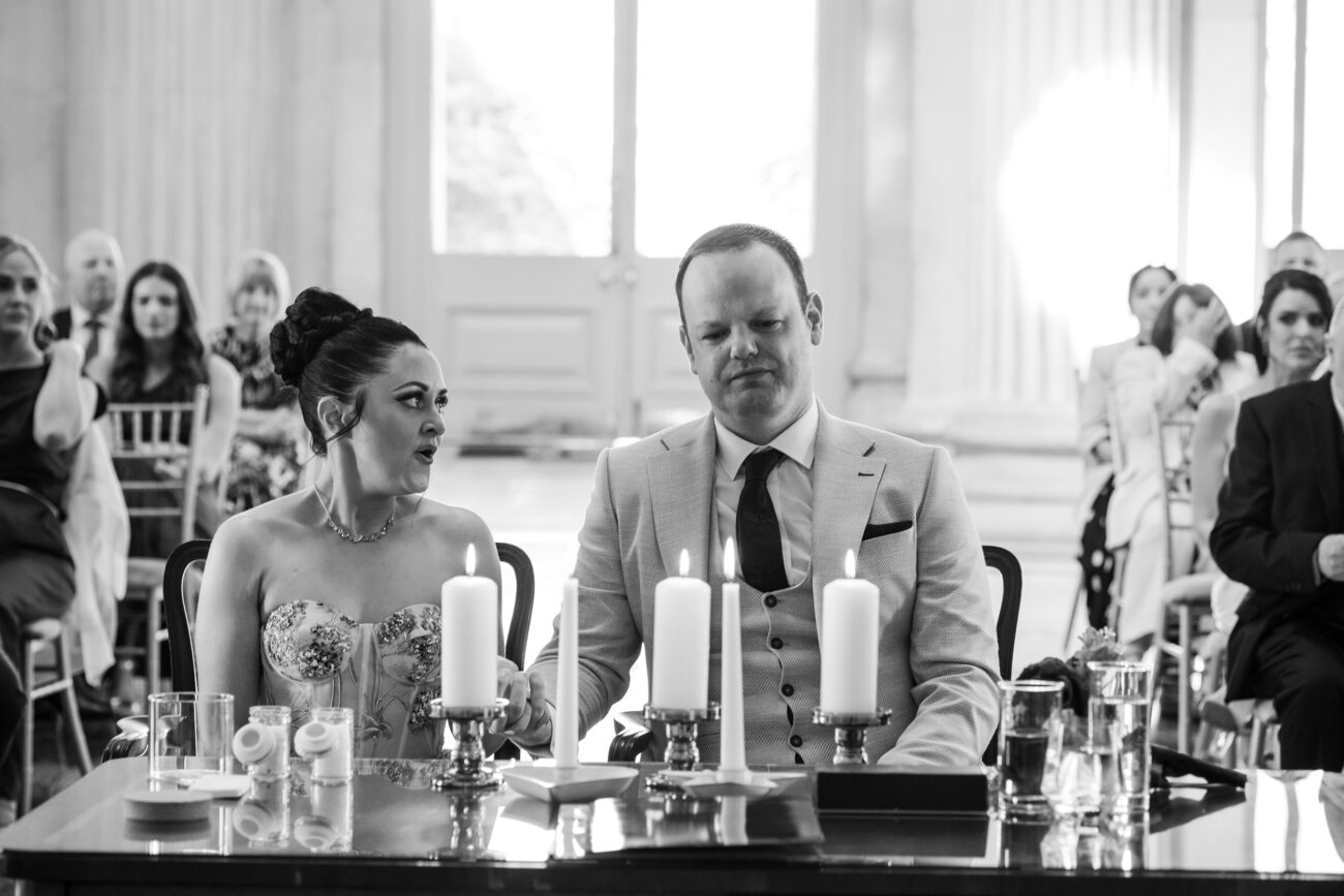 Couple in City Hall during the ceremony taking a deep breath. City Hall wedding, Dublin wedding photographer