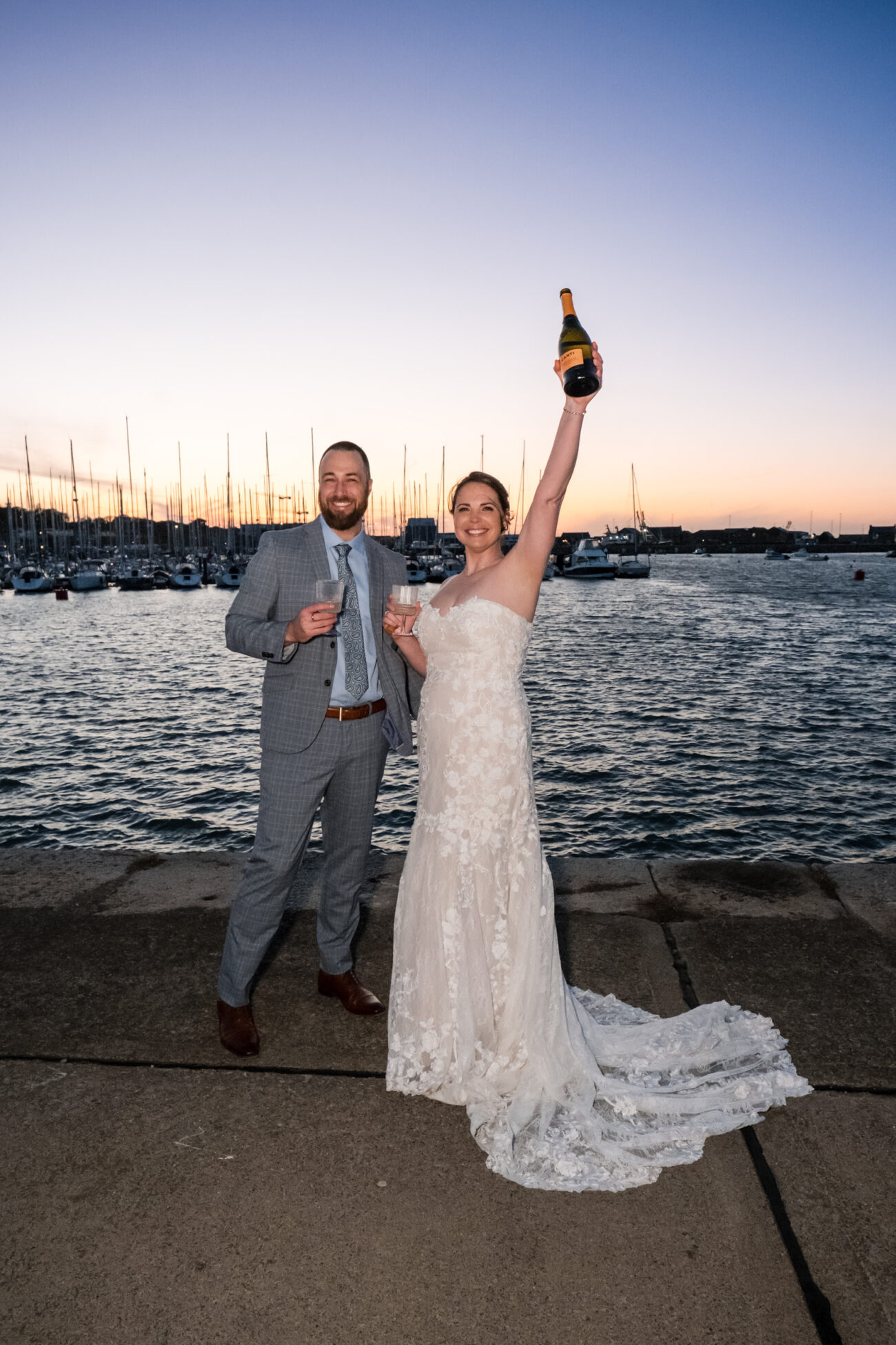 couple drinking champagn in Howth Village, Vow renewal in Dublin, Vow renewal in Howth Village