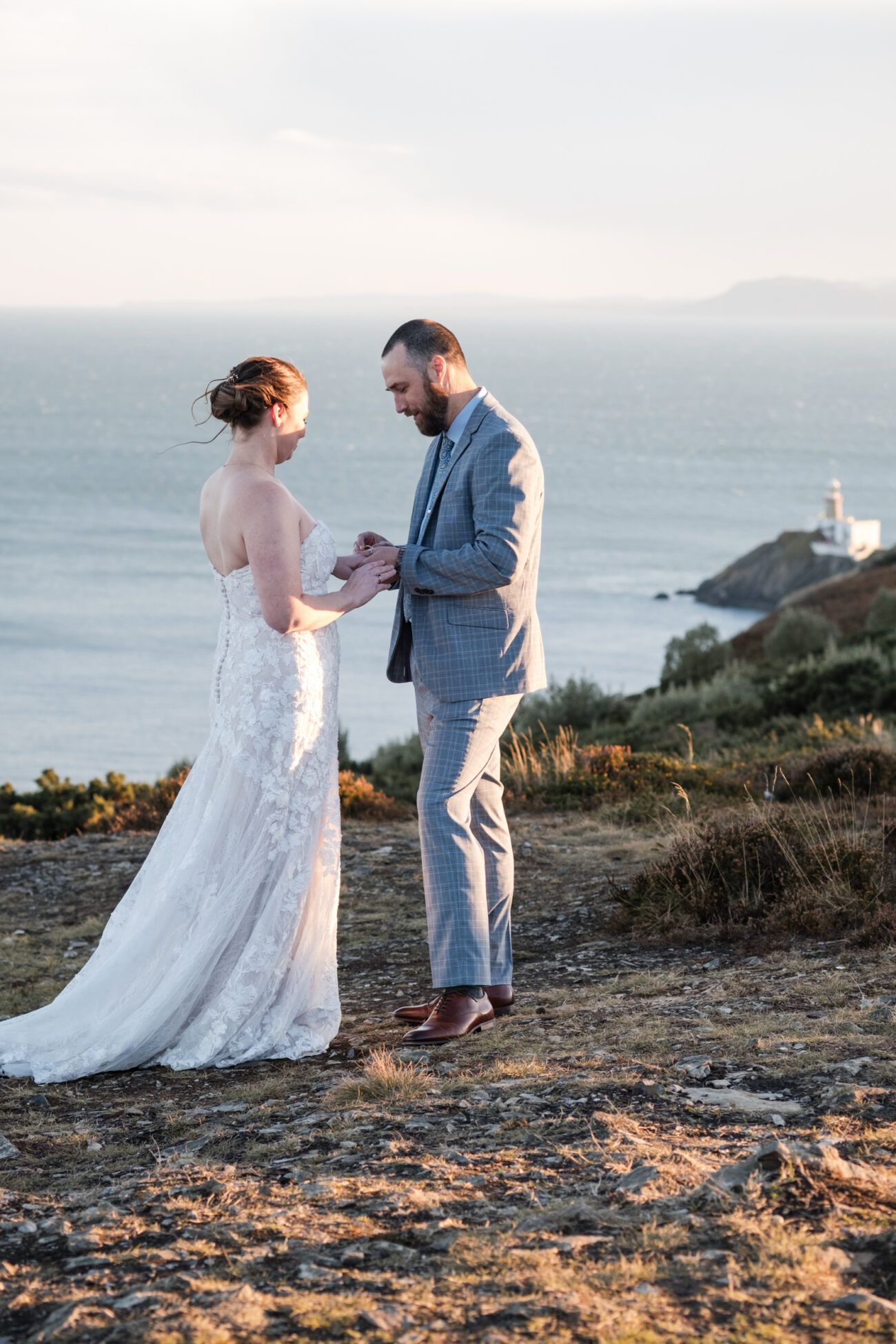 exchanging rings at The Cliffs of Howth