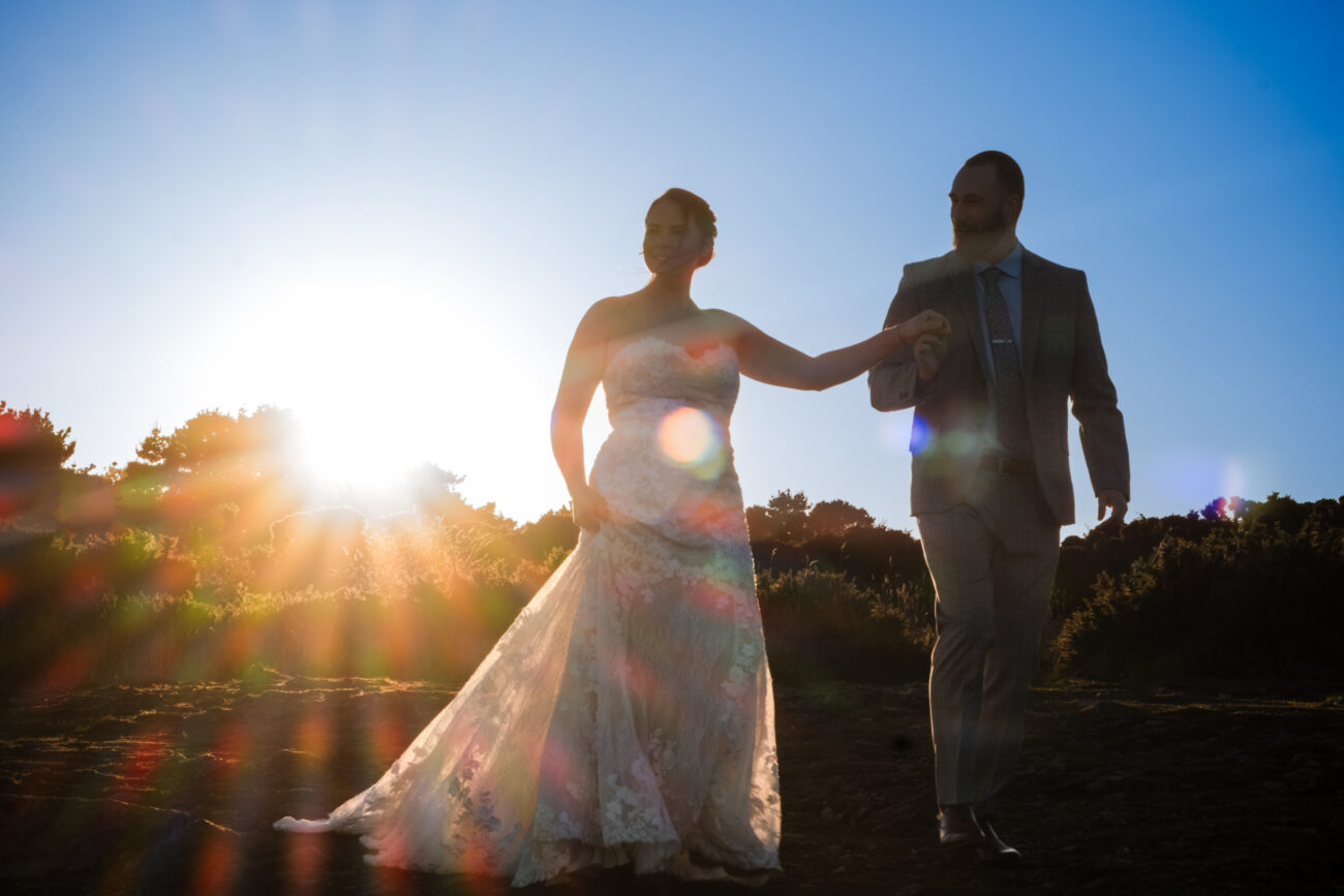 couple walking in the sunset at Cliffs of Howth