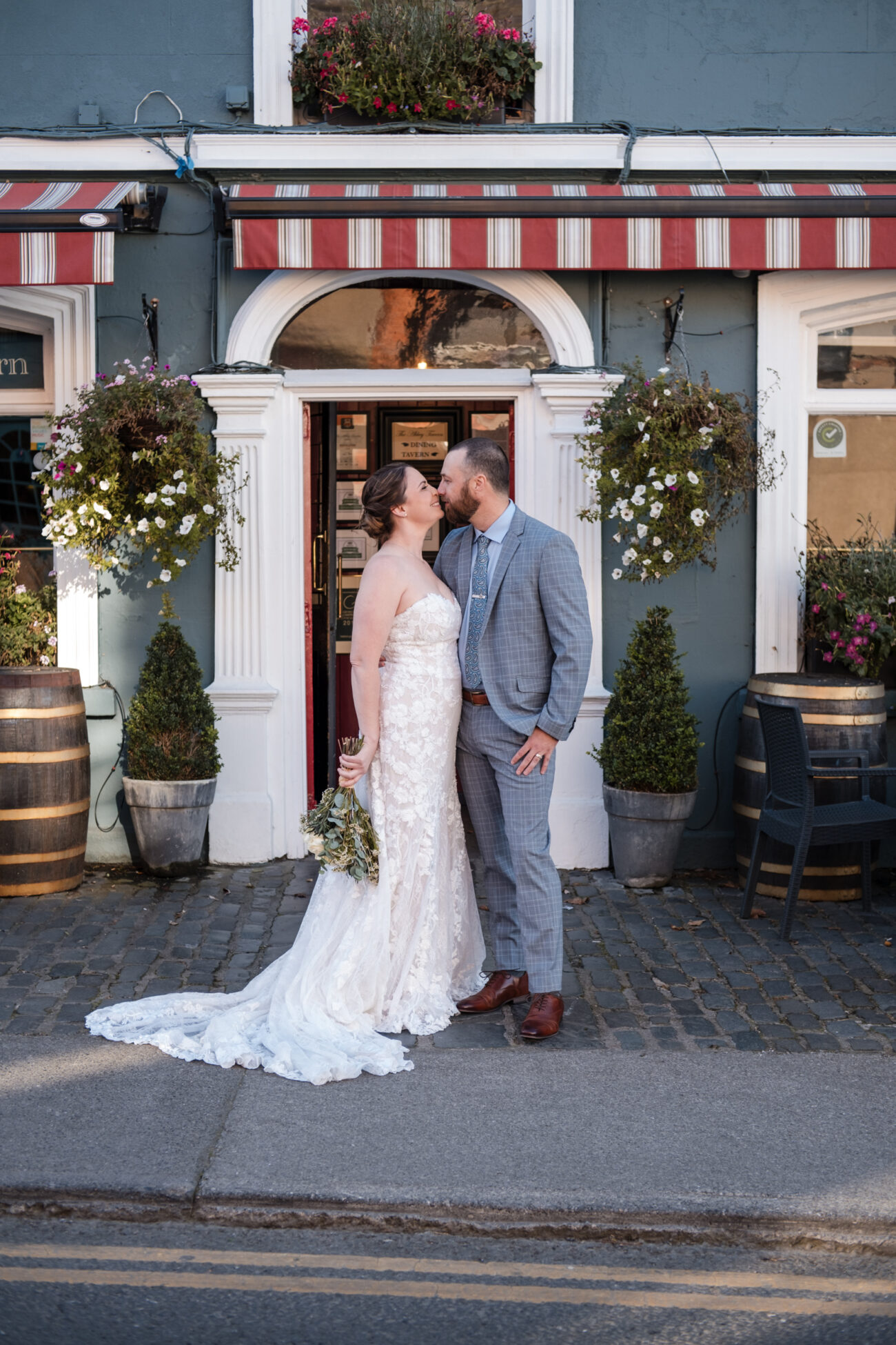 couple standing outside the Abbey Tavern