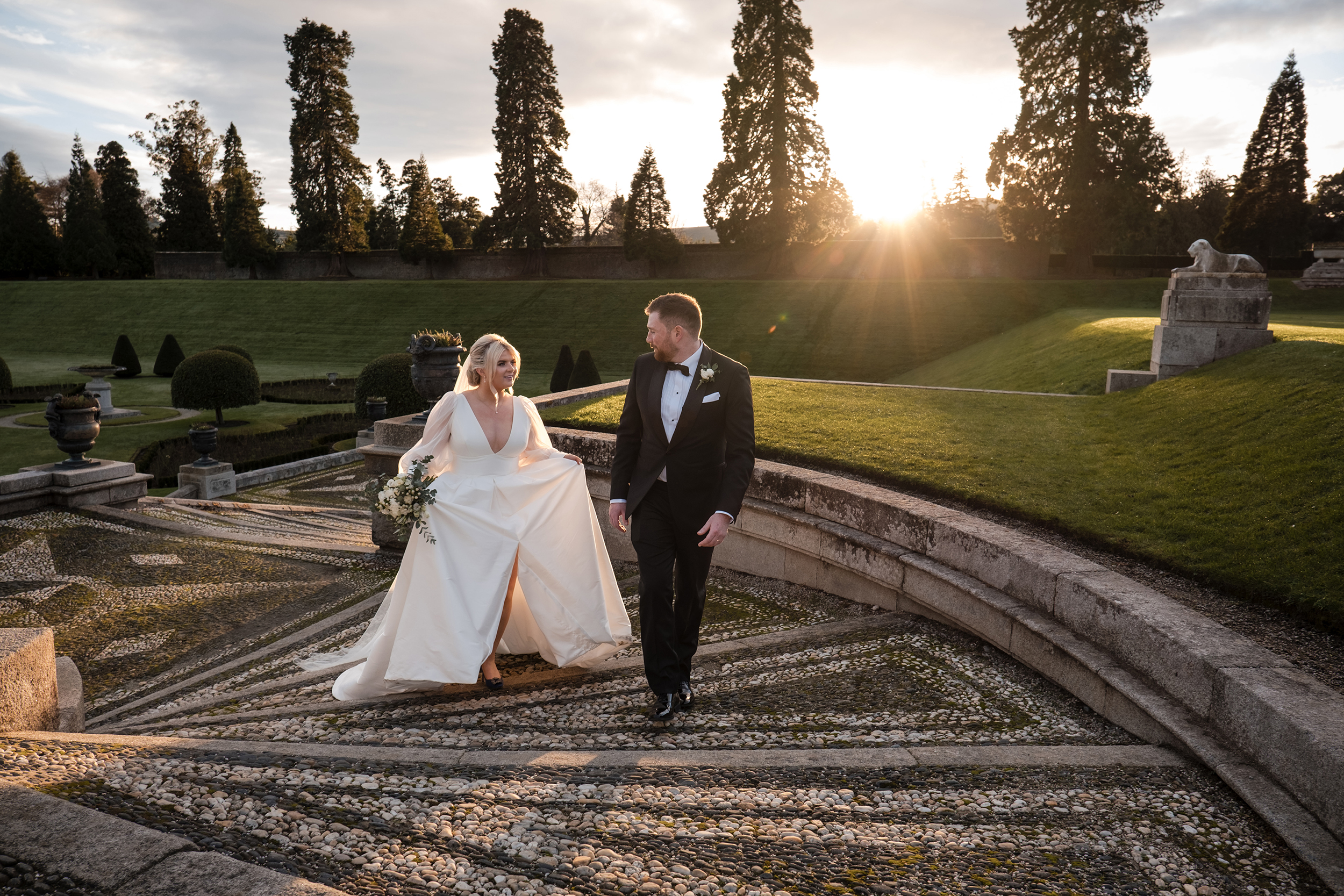 Couple walking up the stairs at Powerscourt Gardens