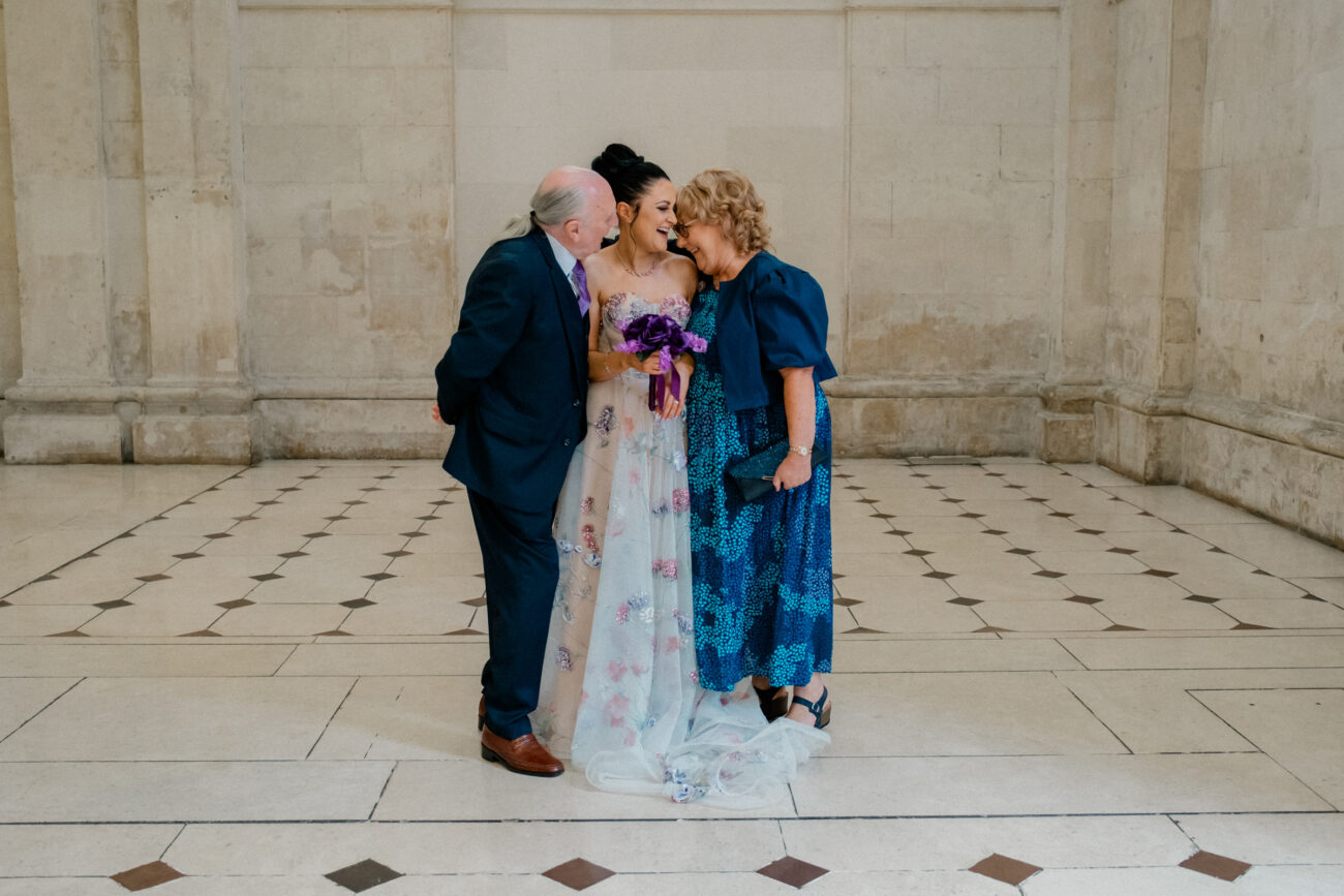 Bride and parents at Dublin City Hall, candid wedding Photography