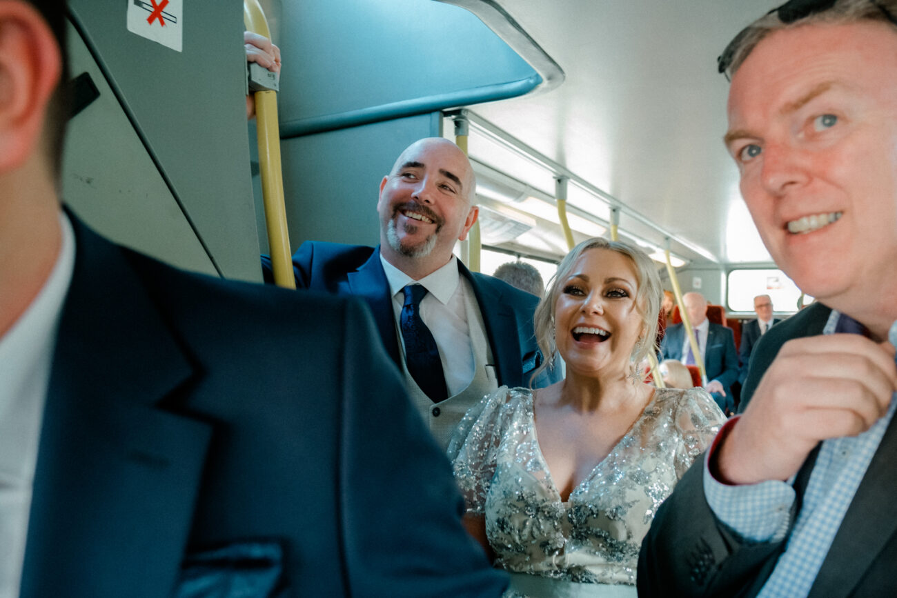 People standing in the bus and laughing