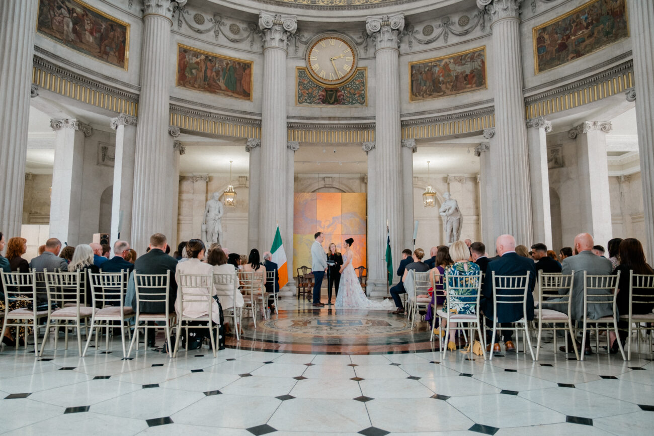 wide shot of couple saying their vows at City Hall