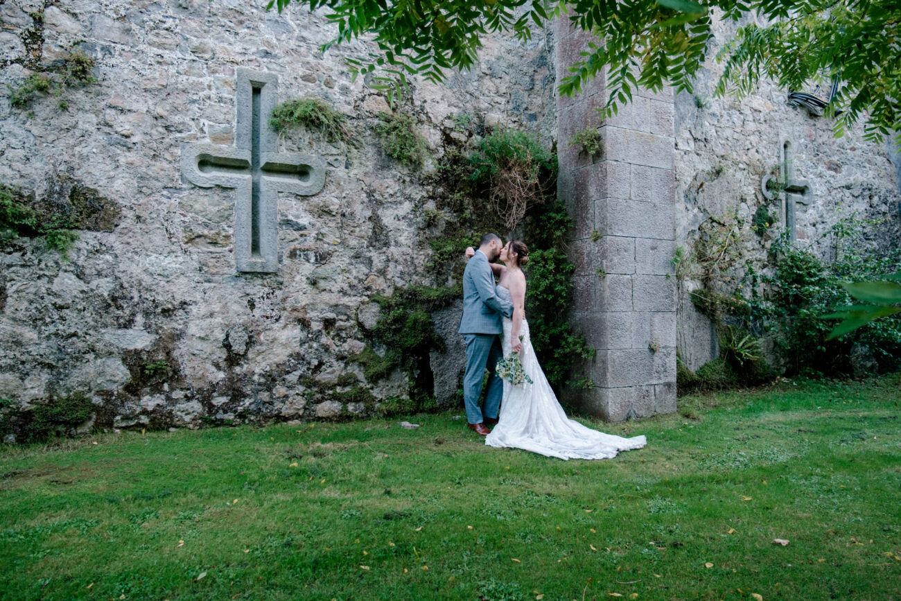 Couple hugging with heads touching at Howth Castle, Elopement in Howth