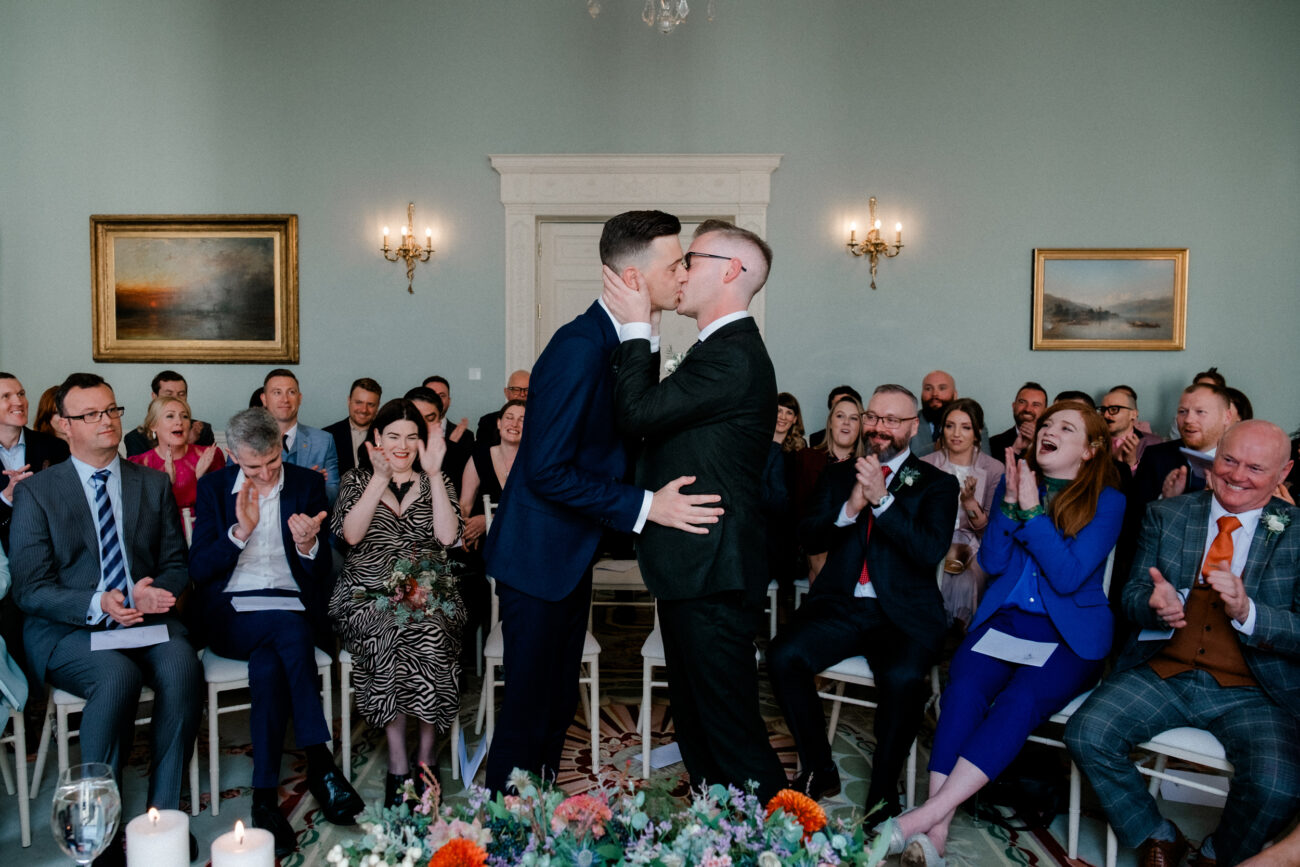 couple having first kiss during the ceremony at Merrion Hotel