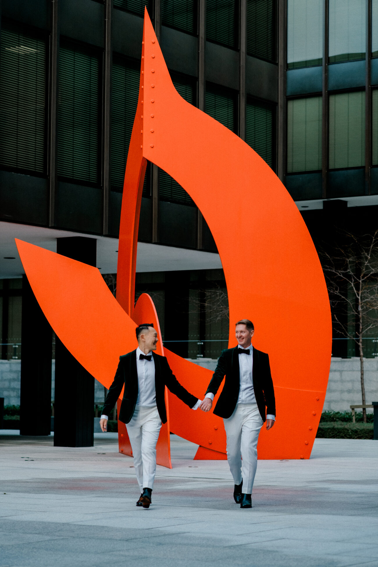 couple walking together and holding hands in Dublin City