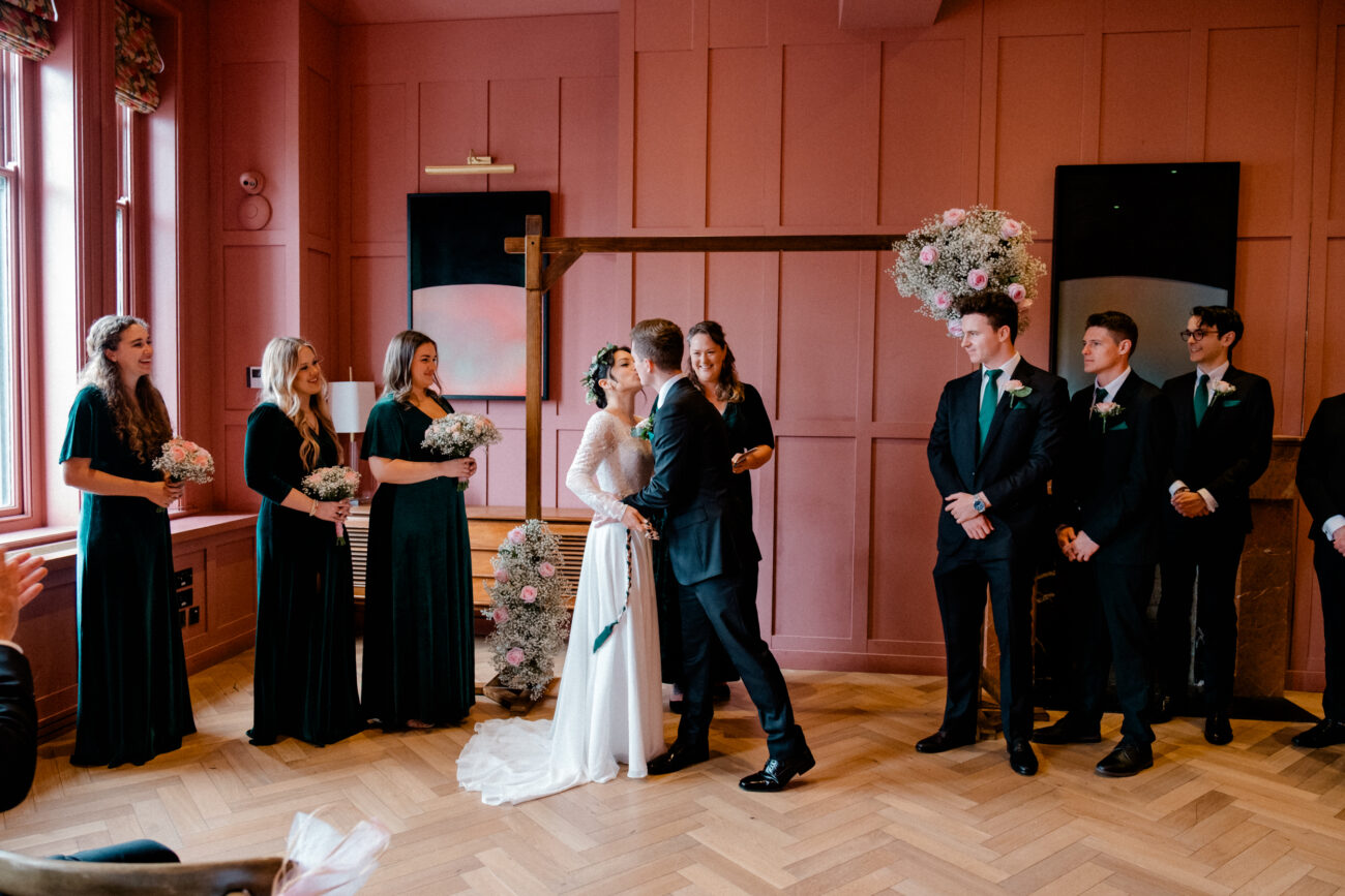 first kiss at a wedding elopement at The Clarence hotel