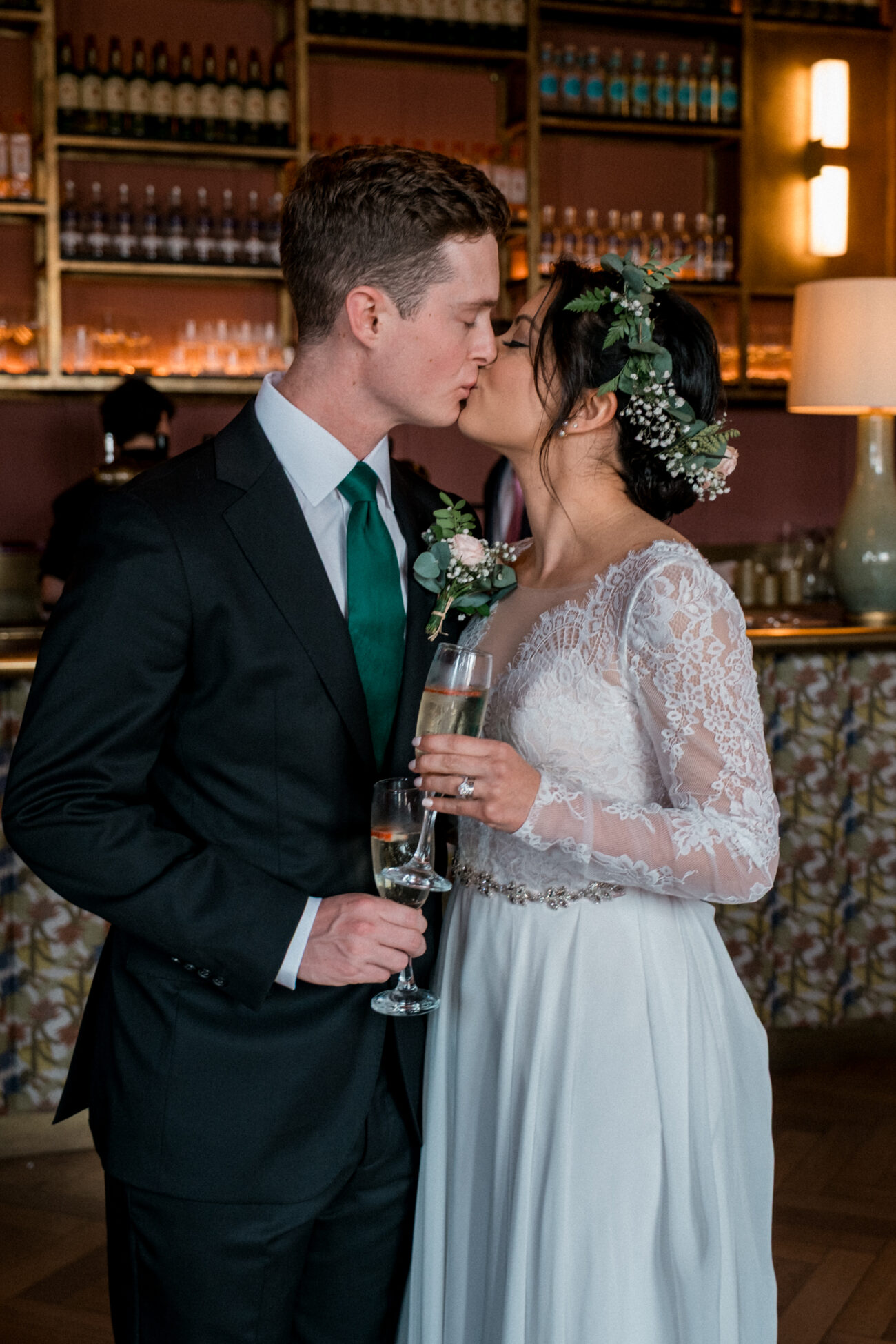 candid shot of the bride and groom kissing at The Clarence Hotel wedding, Dublin elopement